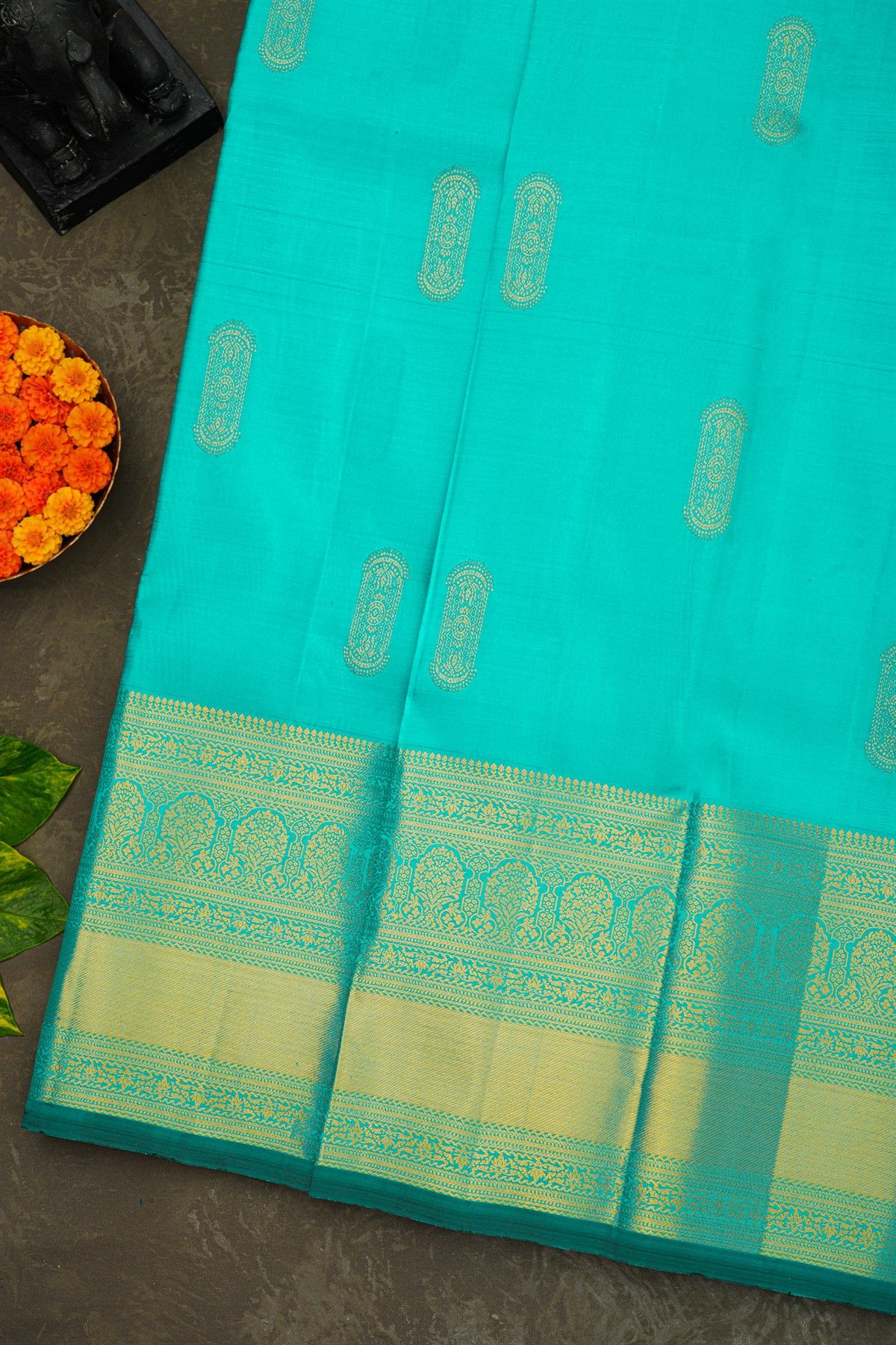Kancheepuram Silk Rama Blue Saree With Florals And Leaves Buttis Body