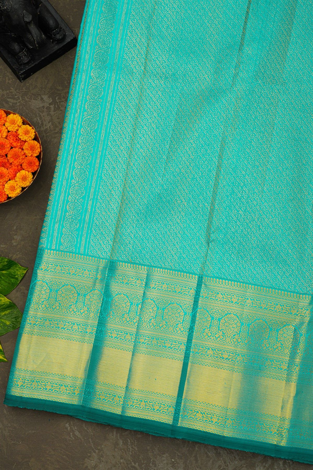 Kancheepuram Silk Rama Blue Saree With Florals And Leaves Buttis Body