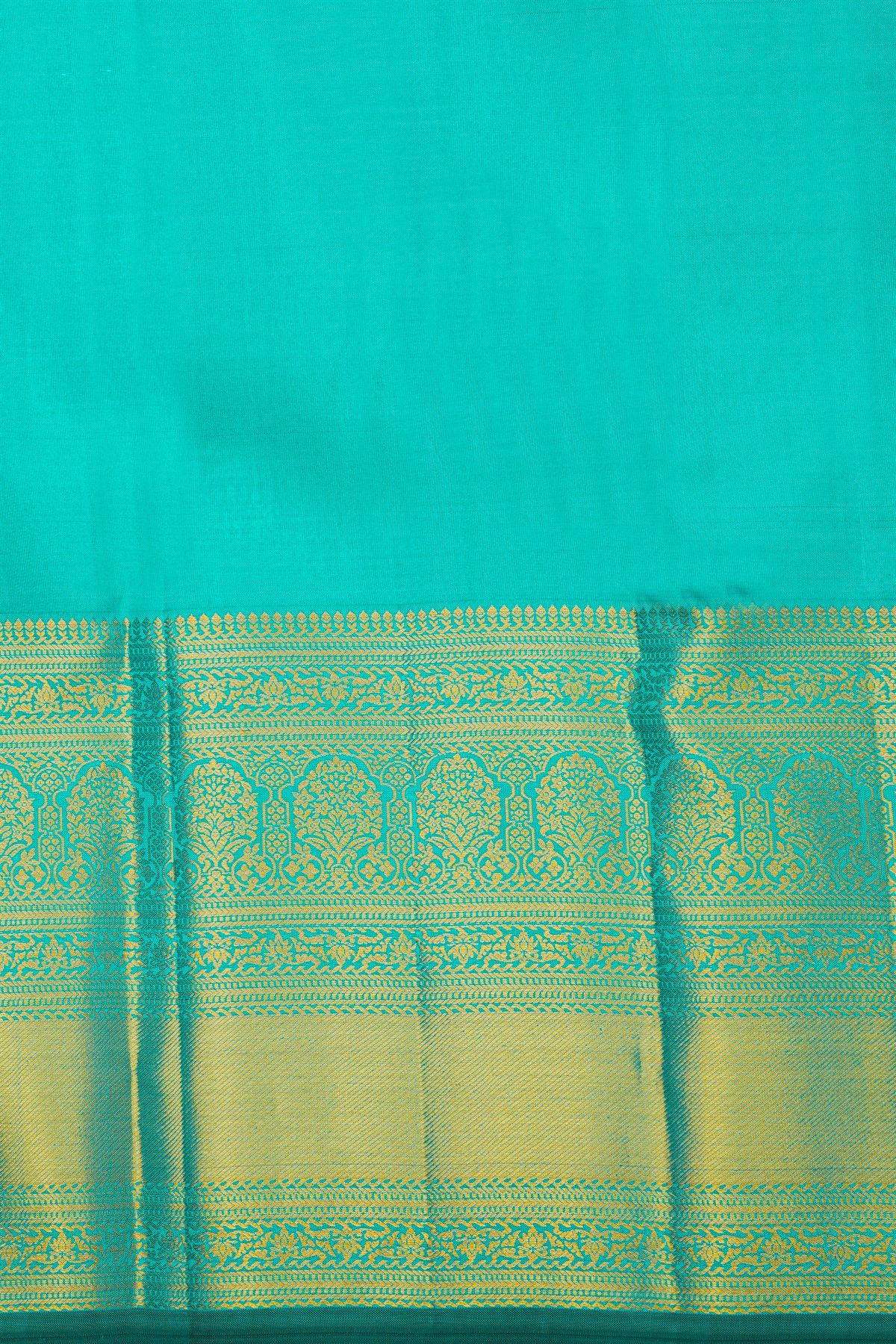 Kancheepuram Silk Rama Blue Saree With Florals And Leaves Buttis Body