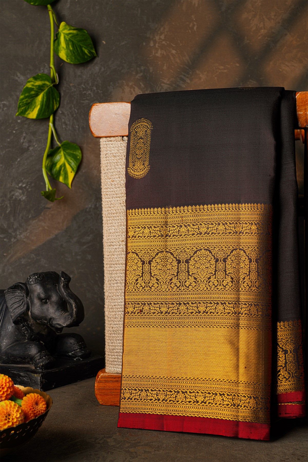 Kancheepuram Silk Black Saree With Florals And Buttis Body