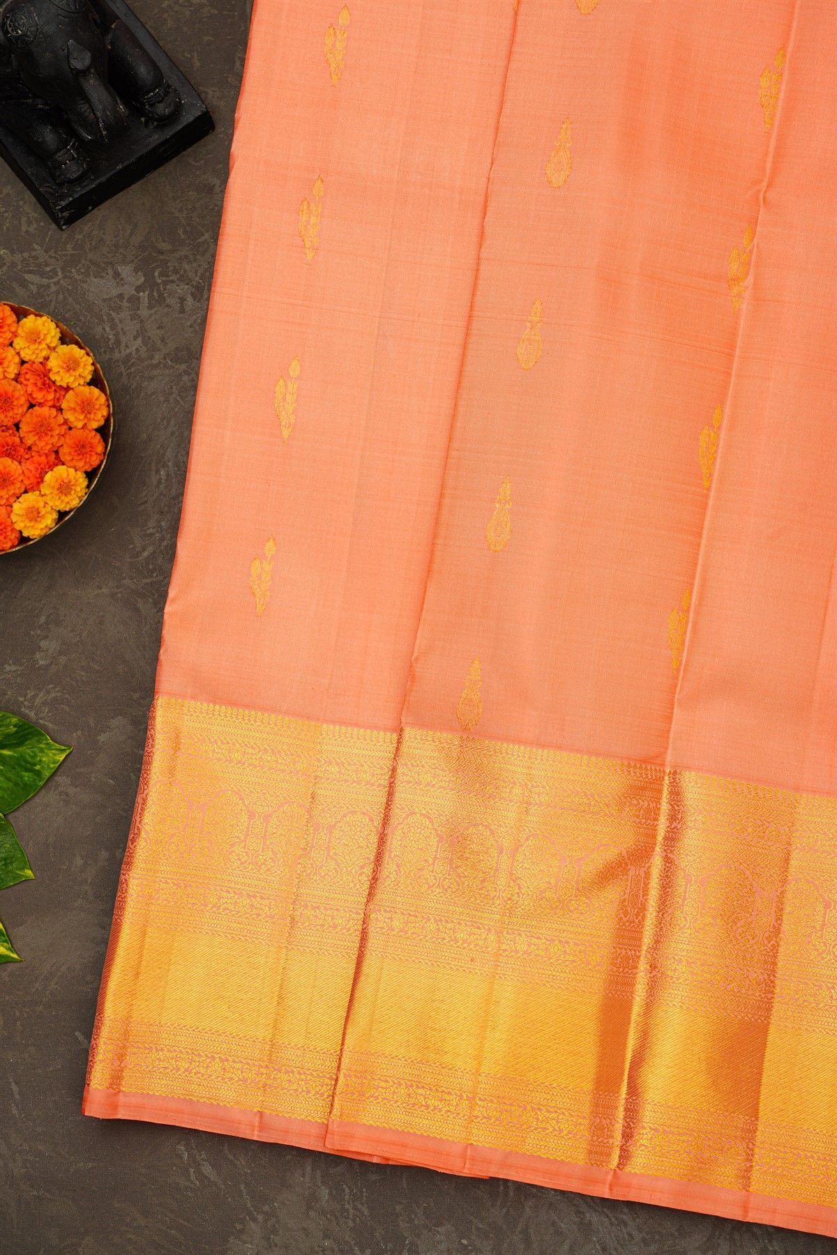 Kancheepuram Silk Peach Saree With Florals And Buttis Body