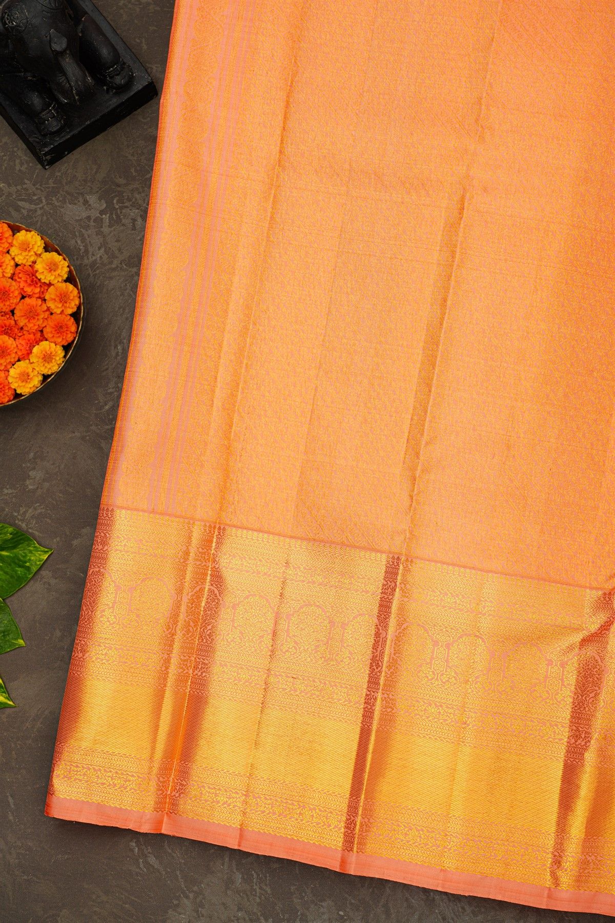 Kancheepuram Silk Peach Saree With Florals And Buttis Body