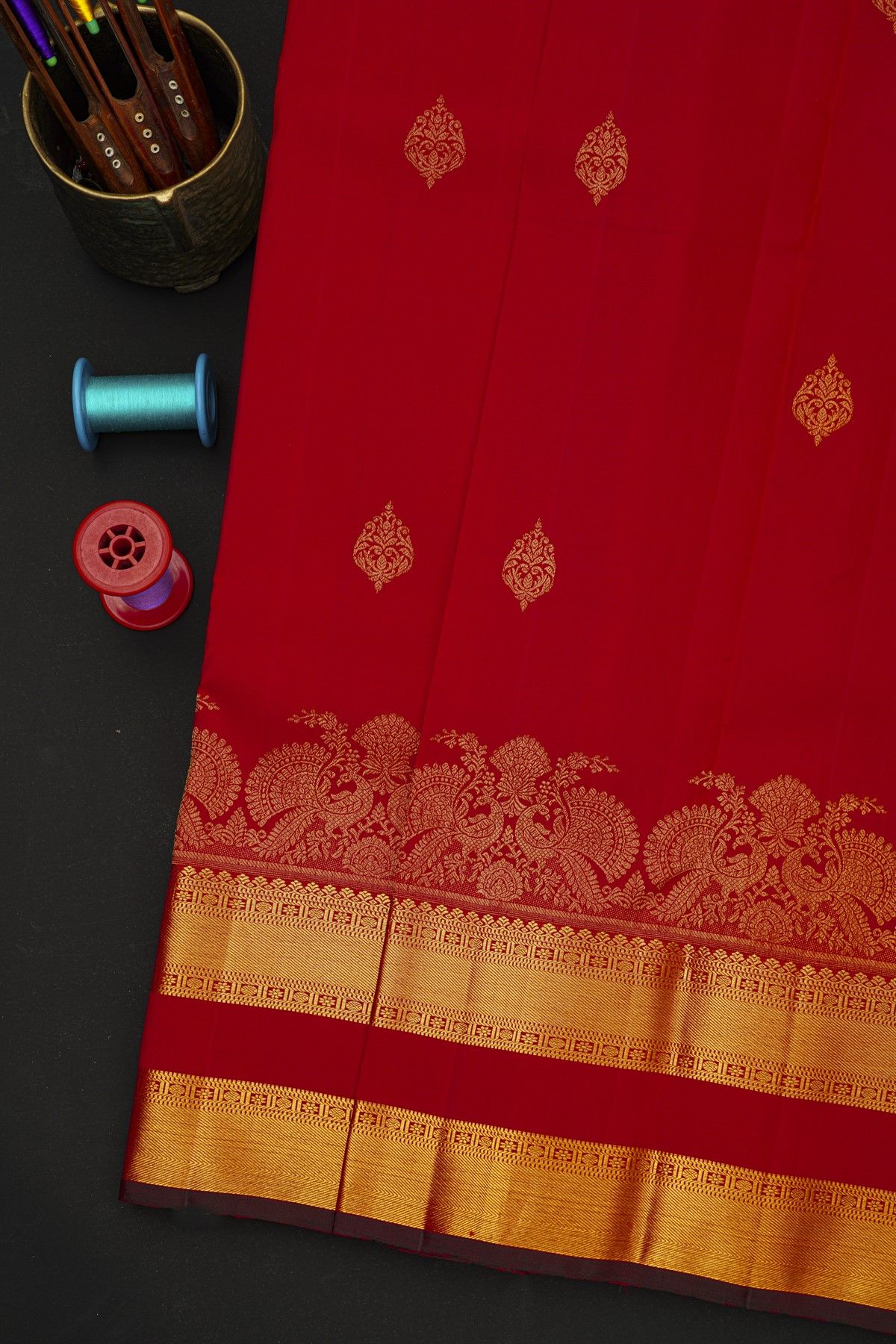 Kancheepuram Silk Red Saree With Florals And Peacock Buttis Body