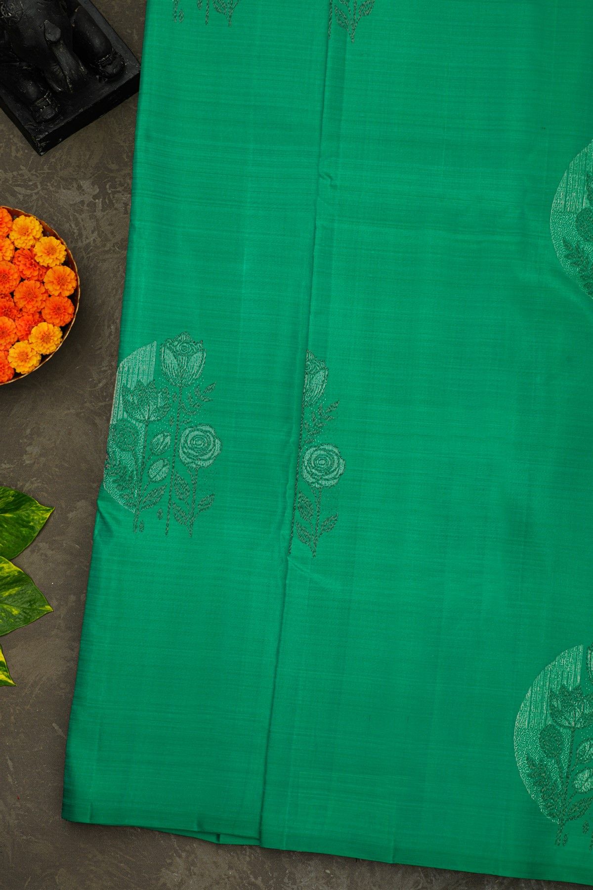 Kancheepuram Silk Leaf Green Saree With Florals And Leaves Body