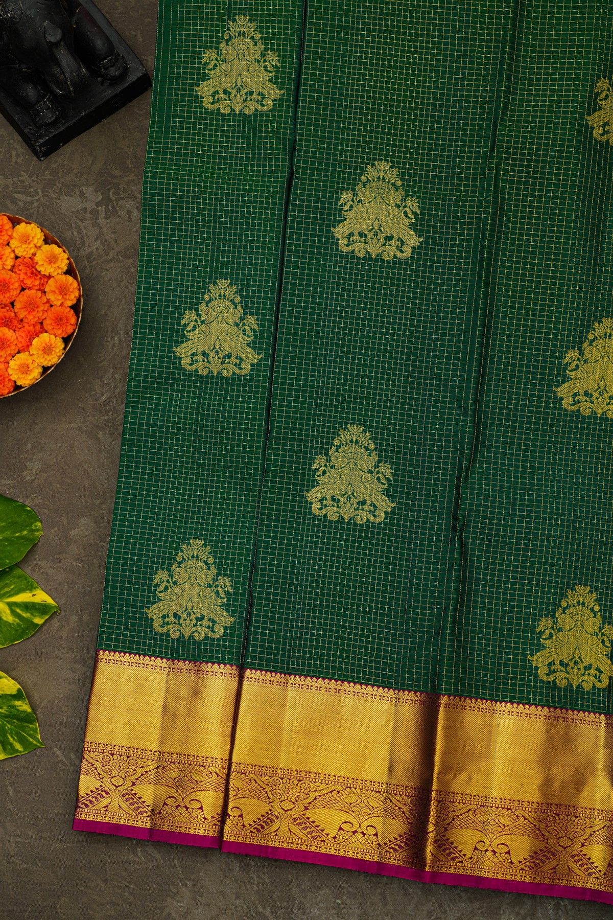 Kancheepuram Silk Bottle Green Saree With Checks And Parrot Buttis Body
