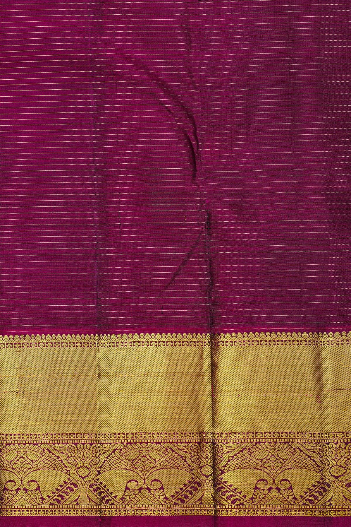 Kancheepuram Silk Bottle Green Saree With Checks And Parrot Buttis Body