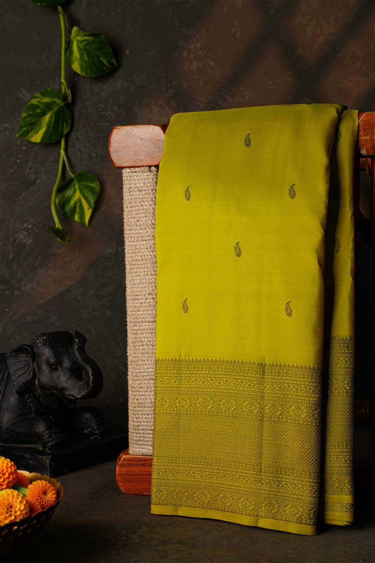 Kancheepuram Silk Leaf Green Saree With Paisley Buttis Body