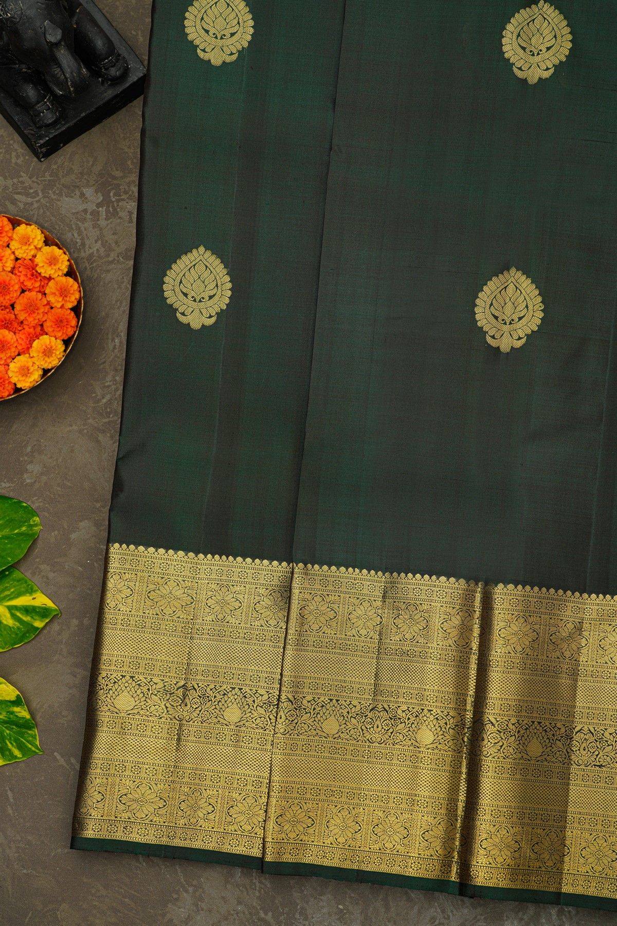 Kancheepuram Silk Bottle Green Saree With Florals And Buttis Body