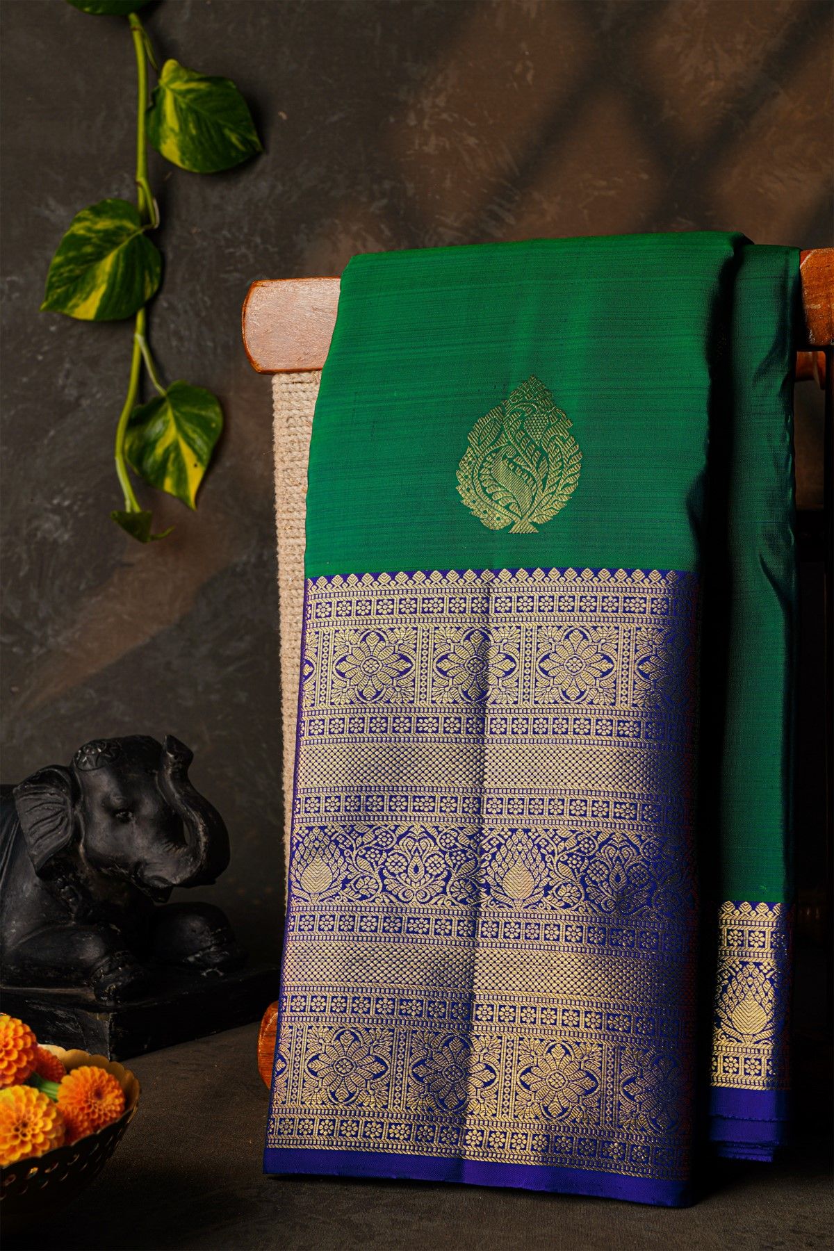 Kancheepuram Silk Peacock Green Saree With Florals And Leaves Border