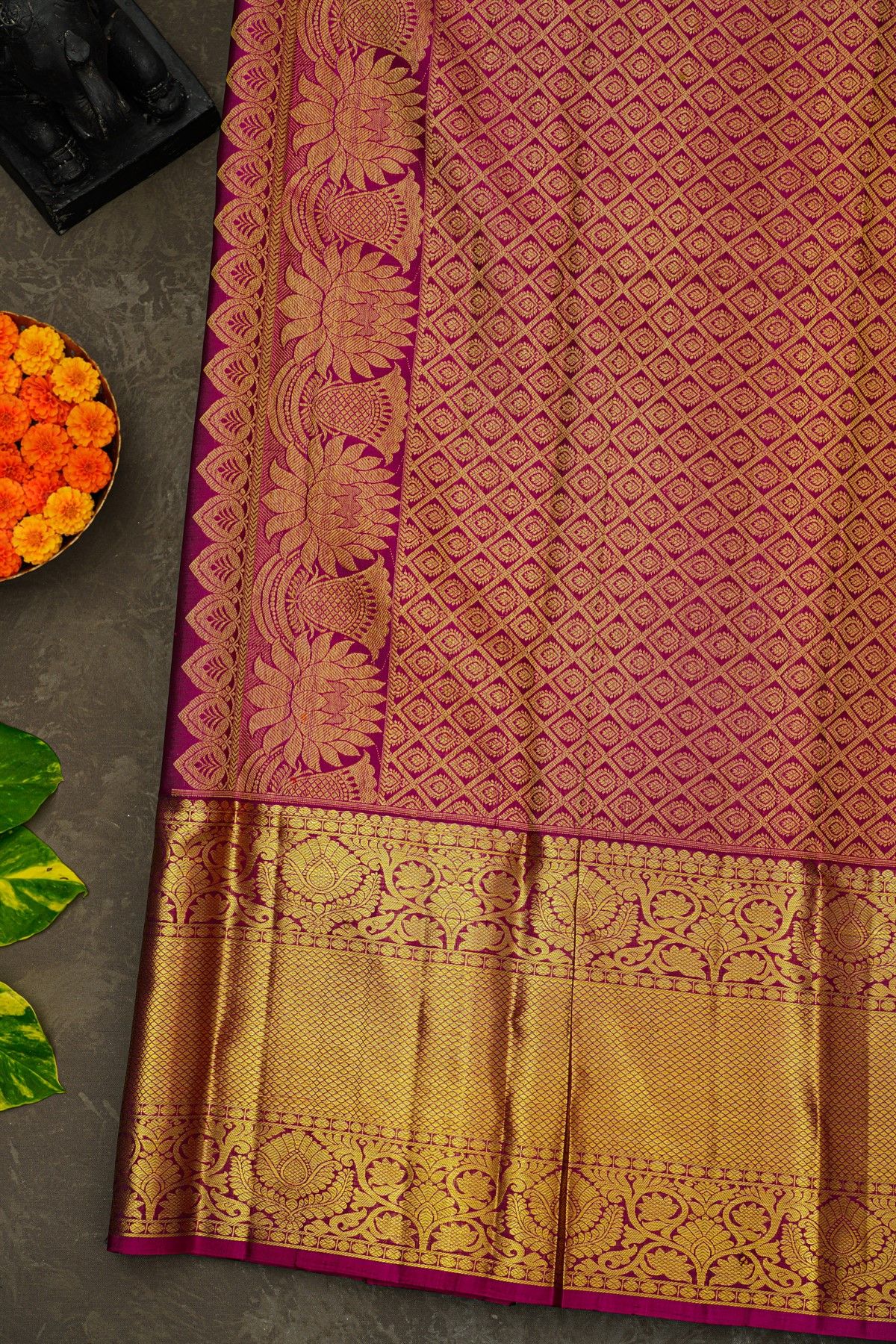 Kancheepuram Silk Bottle Green Saree With Florals And Leaves Border