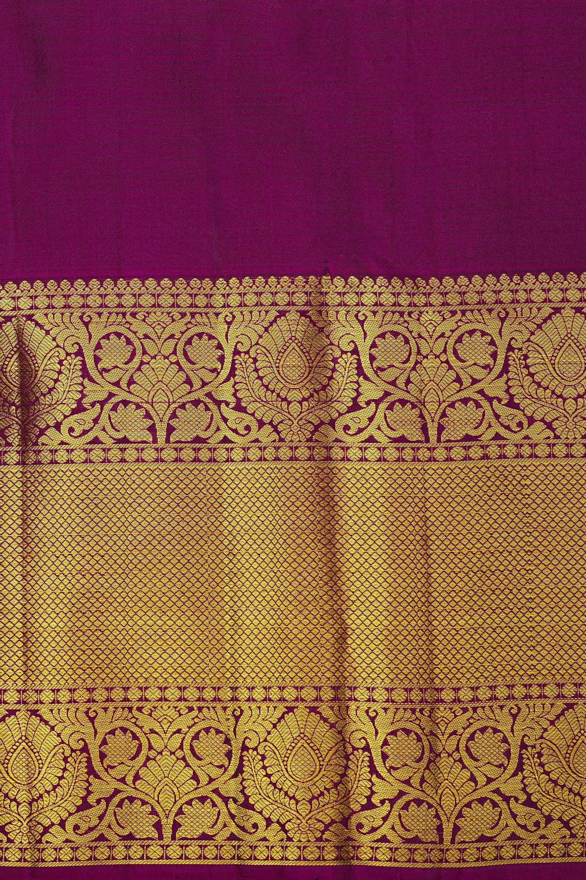 Kancheepuram Silk Bottle Green Saree With Florals And Leaves Border