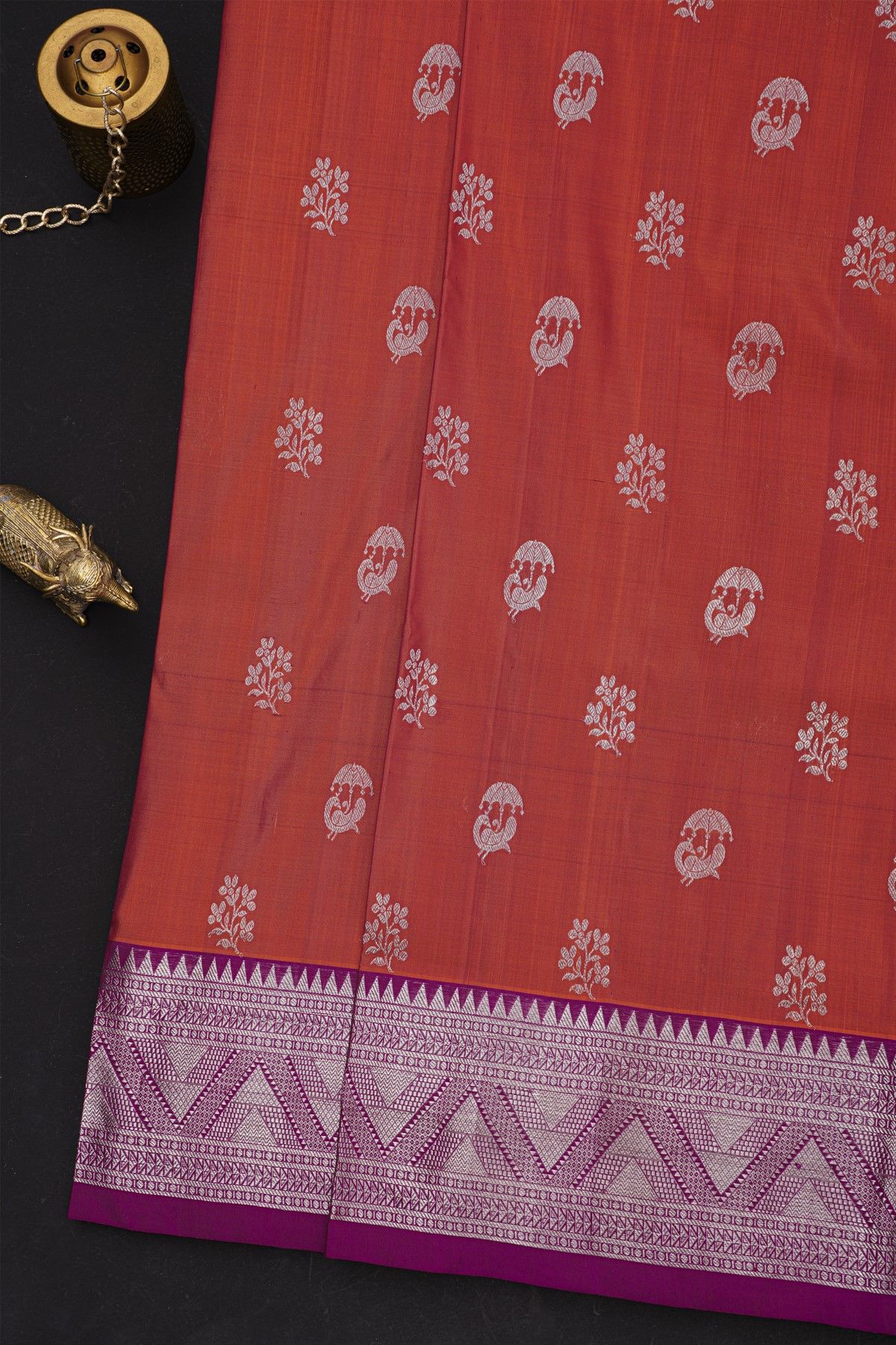 Venkatagiri Silk Rust Orange Saree With Florals And Peacock Buttis Body