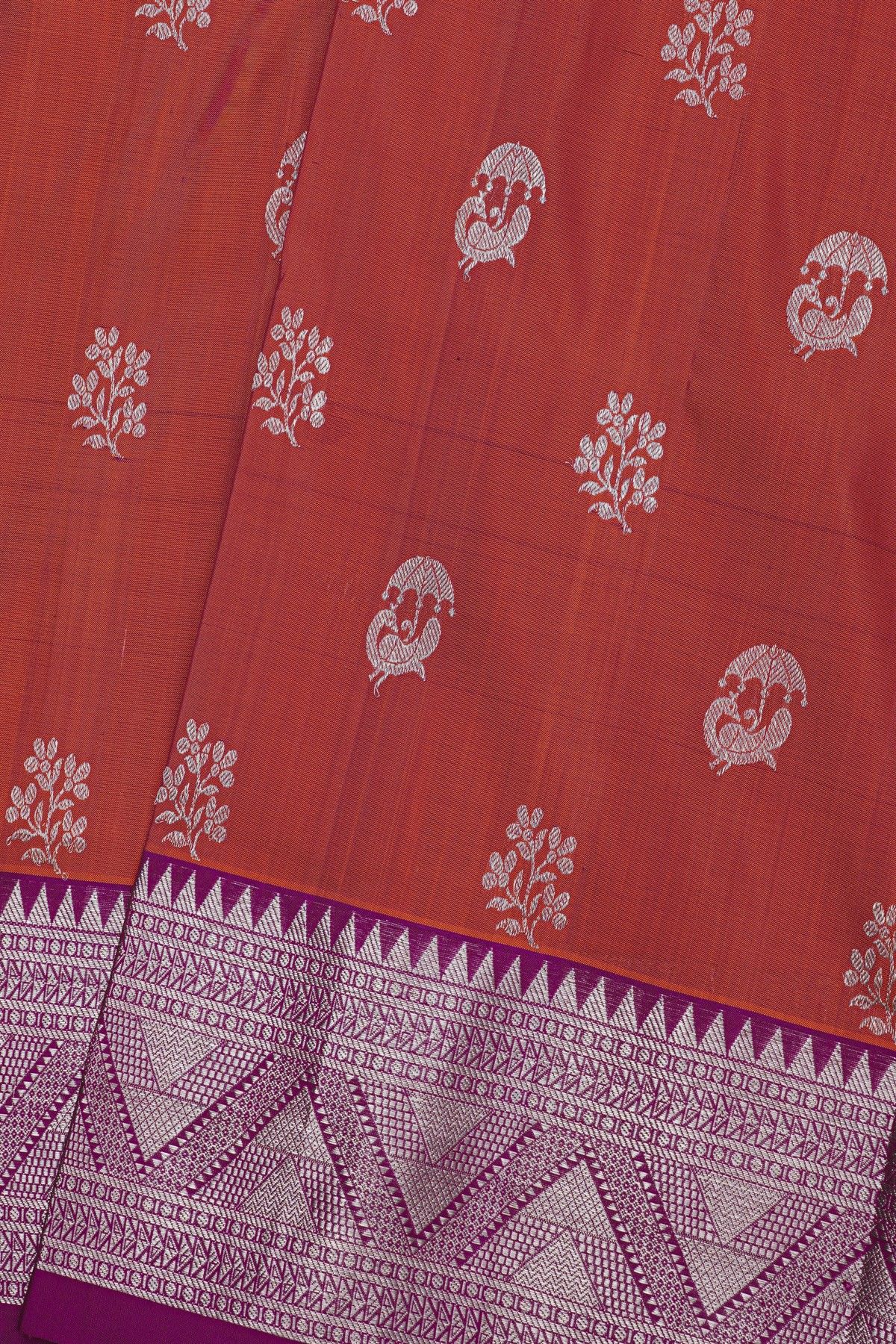Venkatagiri Silk Rust Orange Saree With Florals And Peacock Buttis Body