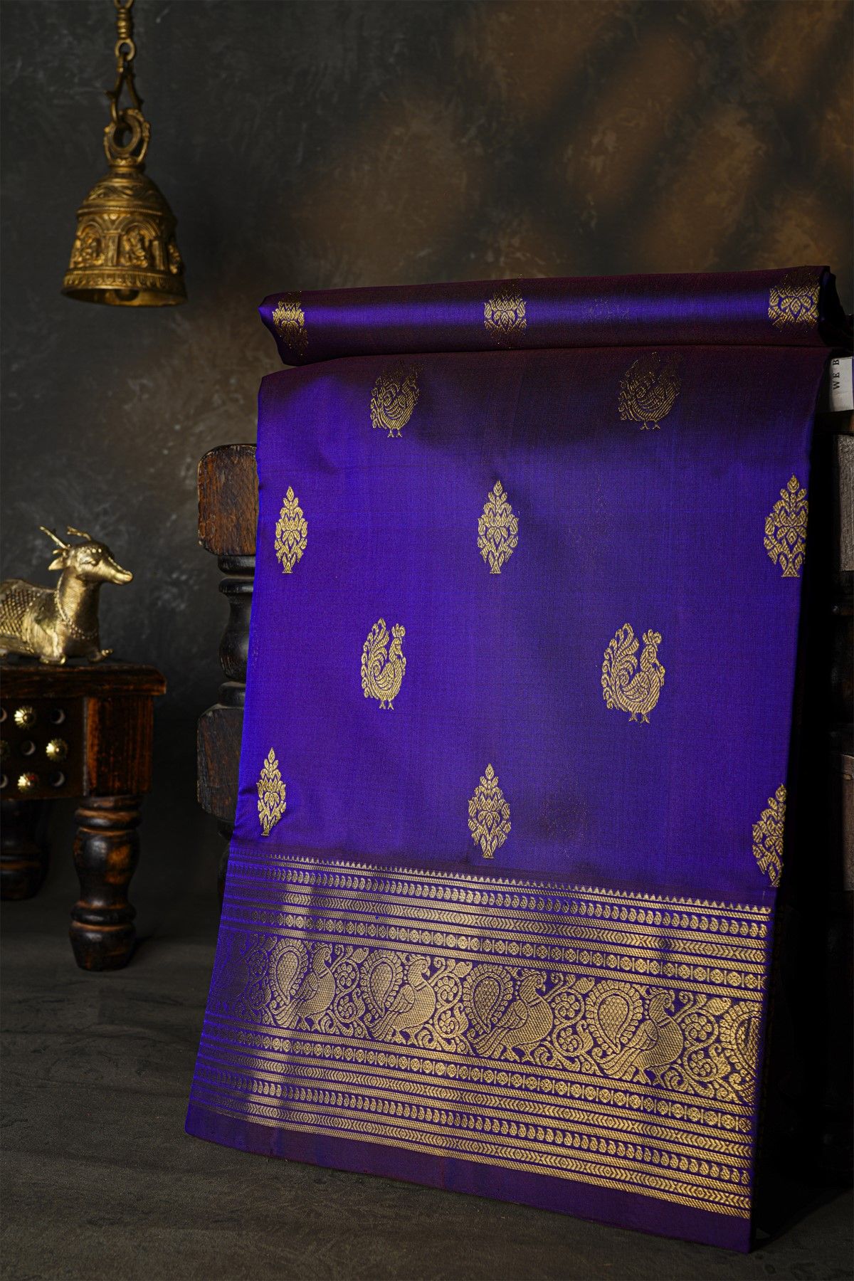 Venkatagiri Silk Dark Violet Saree With Florals And Peacocks Motif Border
