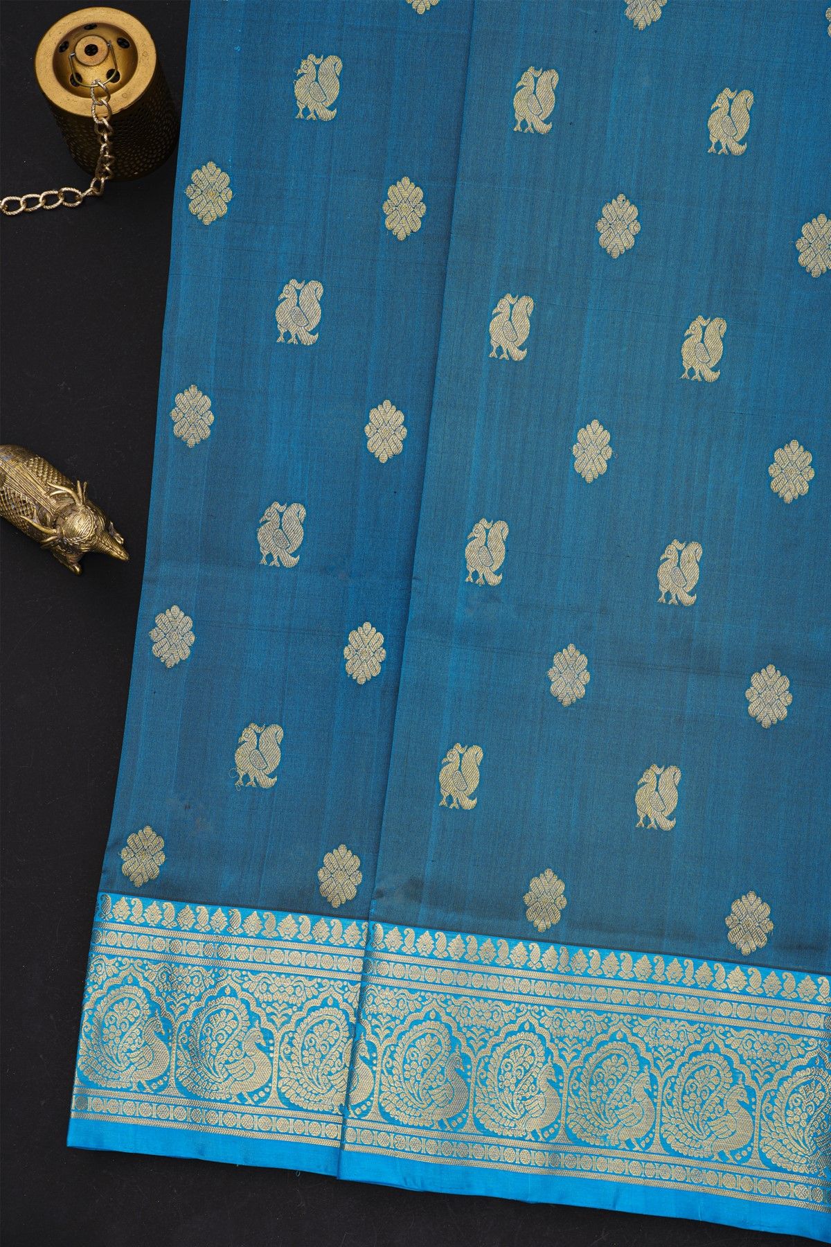 Venkatagiri Silk Royal Blue Saree With Florals And Peacock Buttis Body