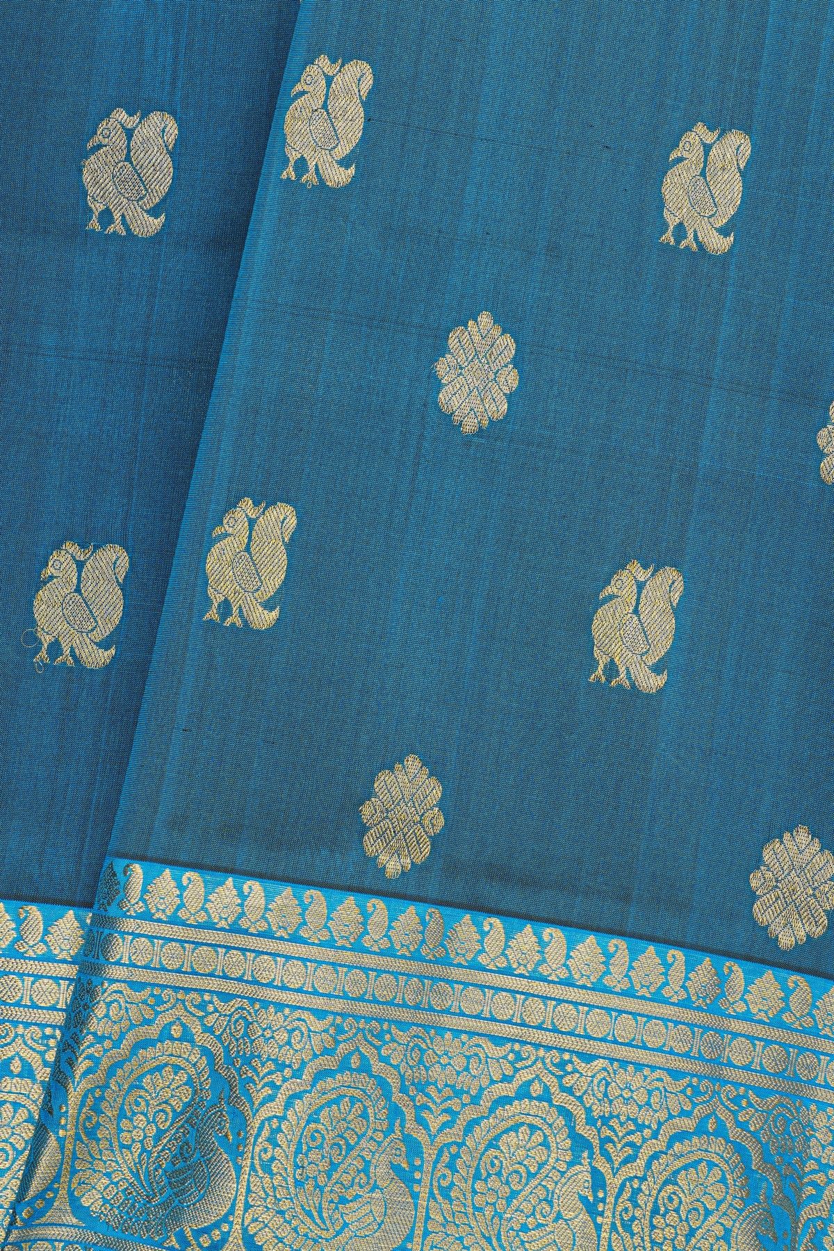 Venkatagiri Silk Royal Blue Saree With Florals And Peacock Buttis Body