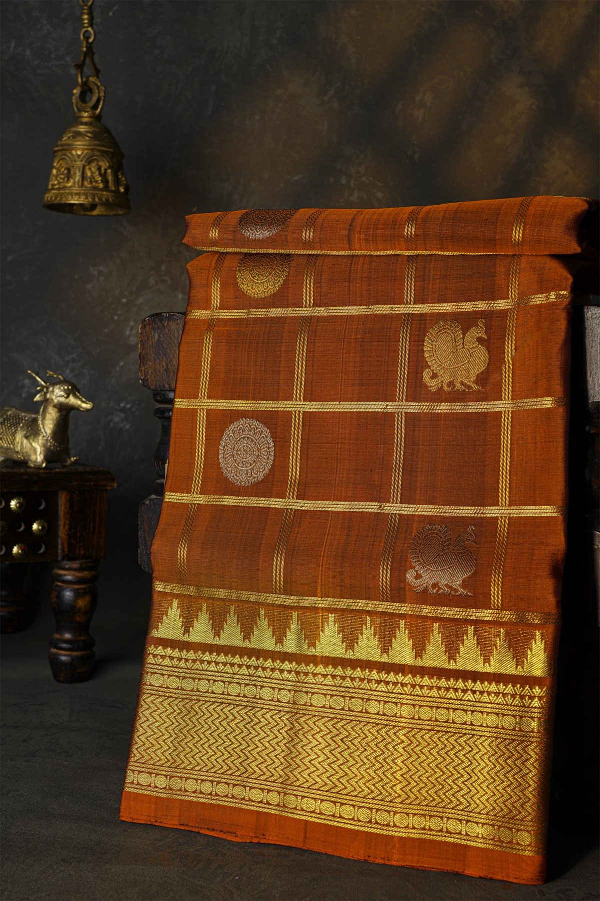 Venkatagiri Silk Rust Orange Saree With Zari Checks And Peacock Buttis Body