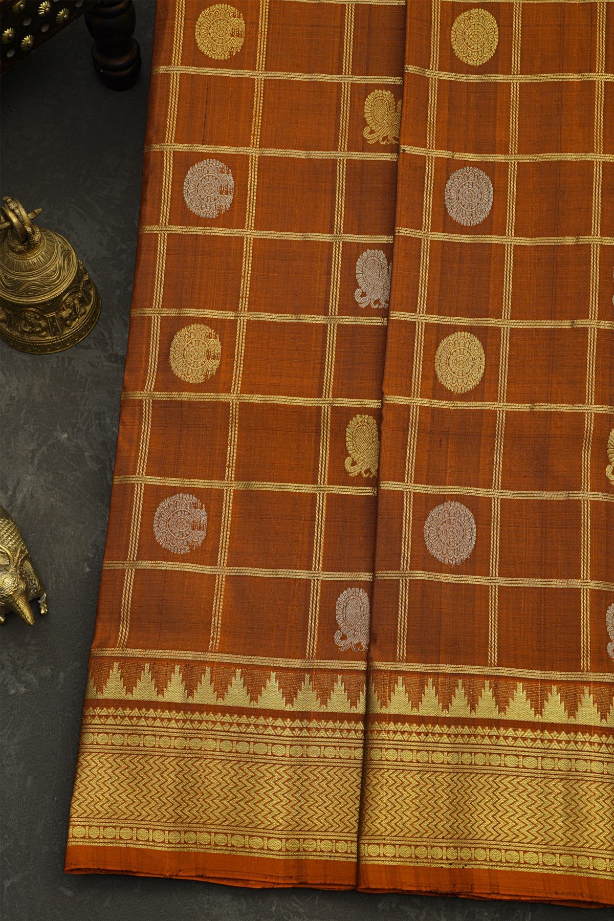 Venkatagiri Silk Rust Orange Saree With Zari Checks And Peacock Buttis Body