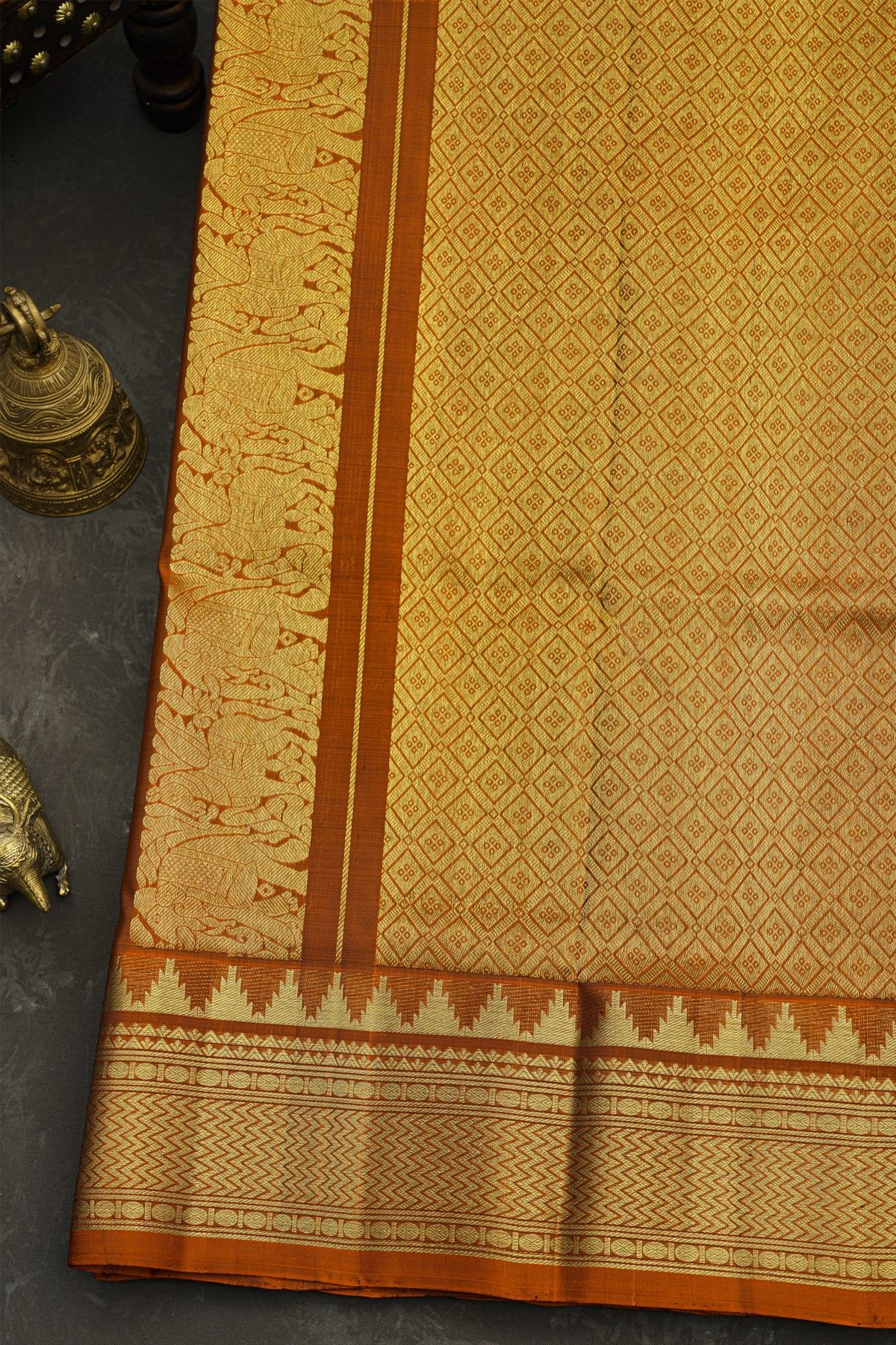 Venkatagiri Silk Rust Orange Saree With Zari Checks And Peacock Buttis Body