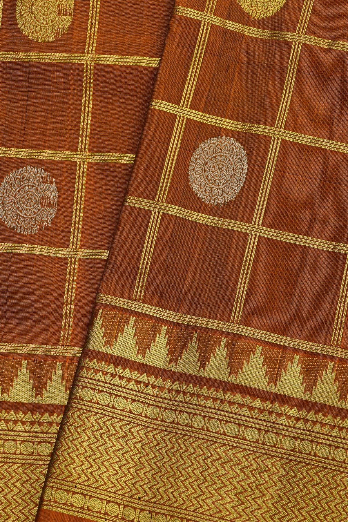 Venkatagiri Silk Rust Orange Saree With Zari Checks And Peacock Buttis Body