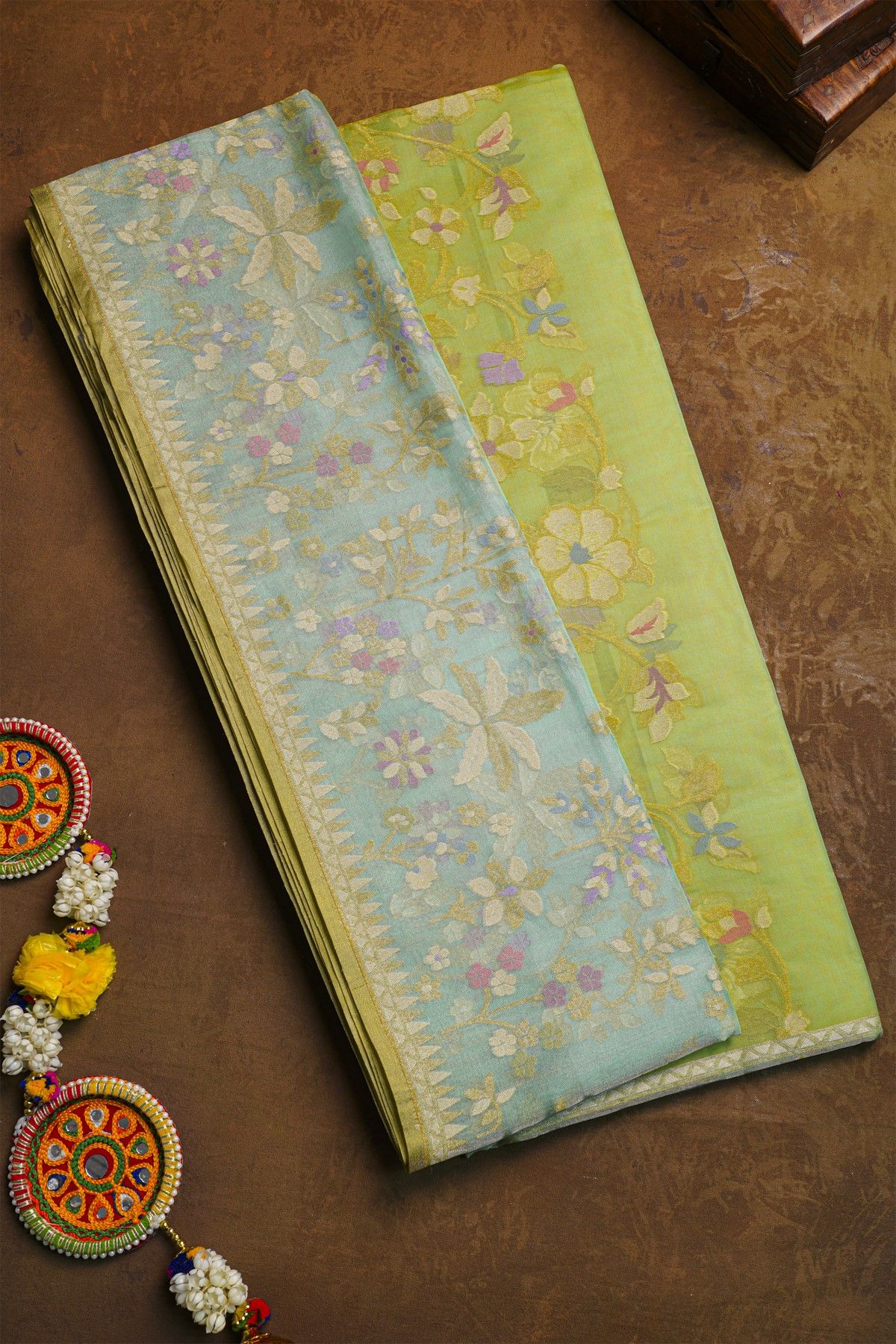 Fancy Organza Lime Green Saree With Florals And Leaves Body
