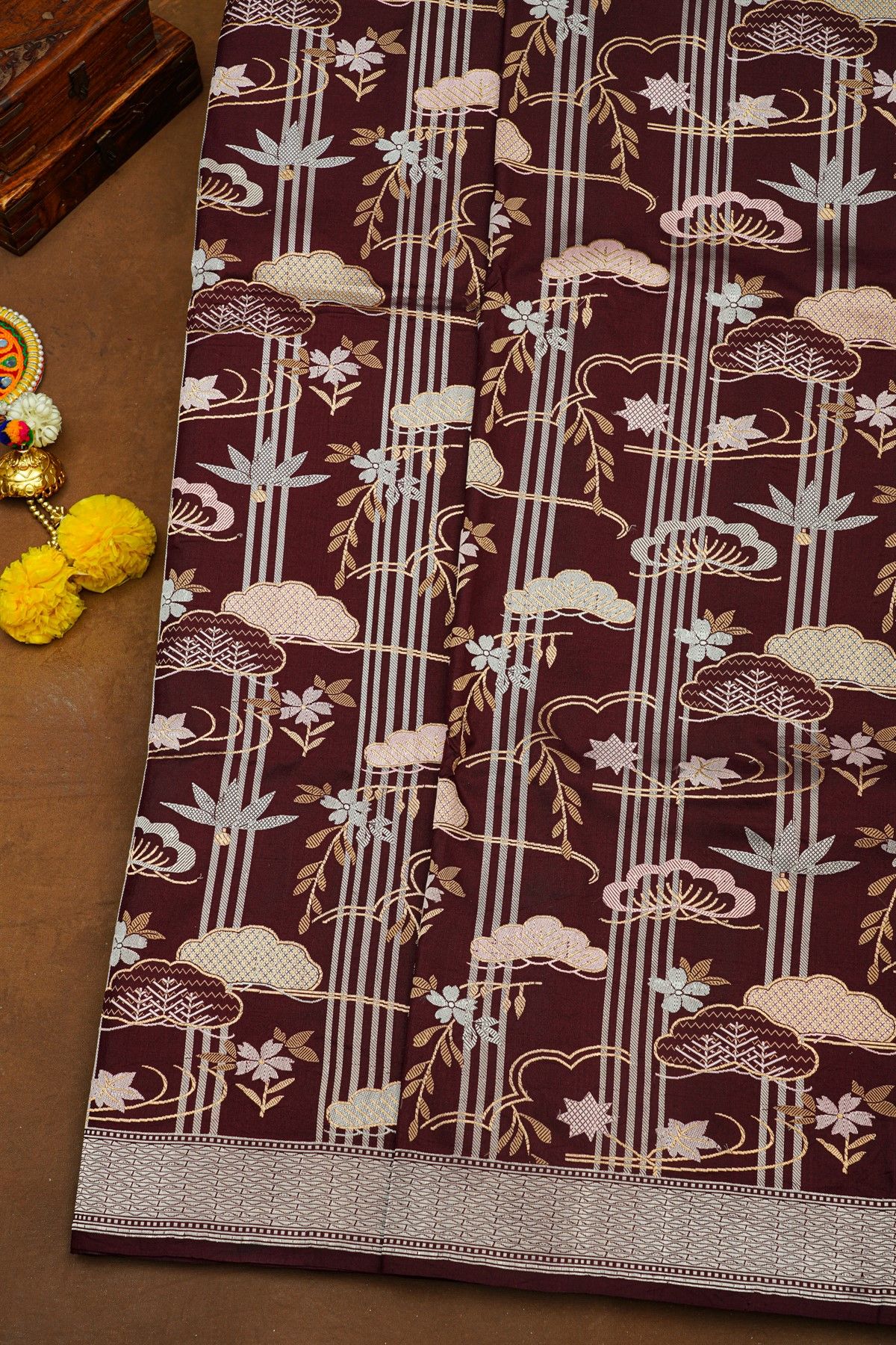 Banarasi Silk Maroon Saree With Zari Lines And Floral Buttis Body