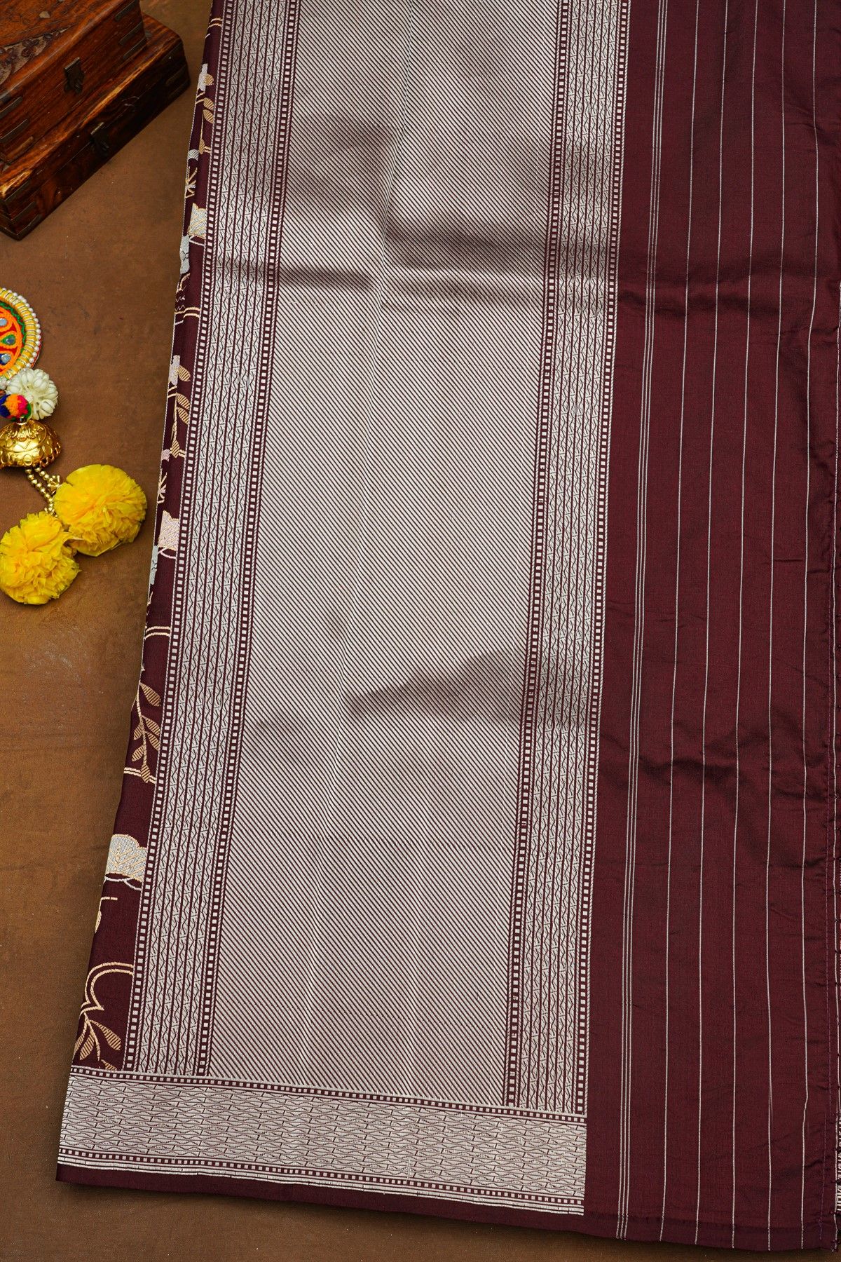 Banarasi Silk Maroon Saree With Zari Lines And Floral Buttis Body