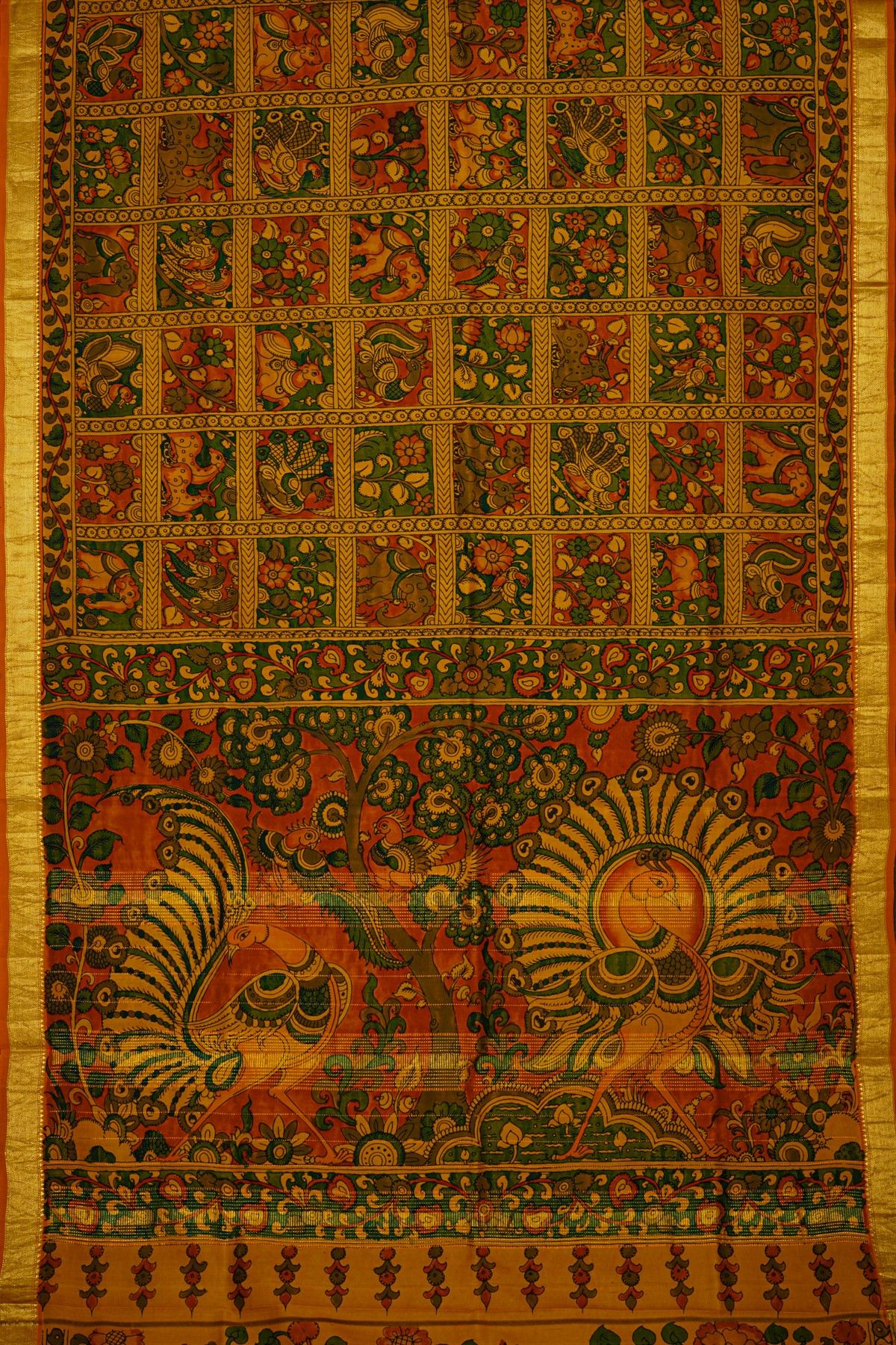 Kalamkari Silk Orange Saree With Cross Lines In Zari Border