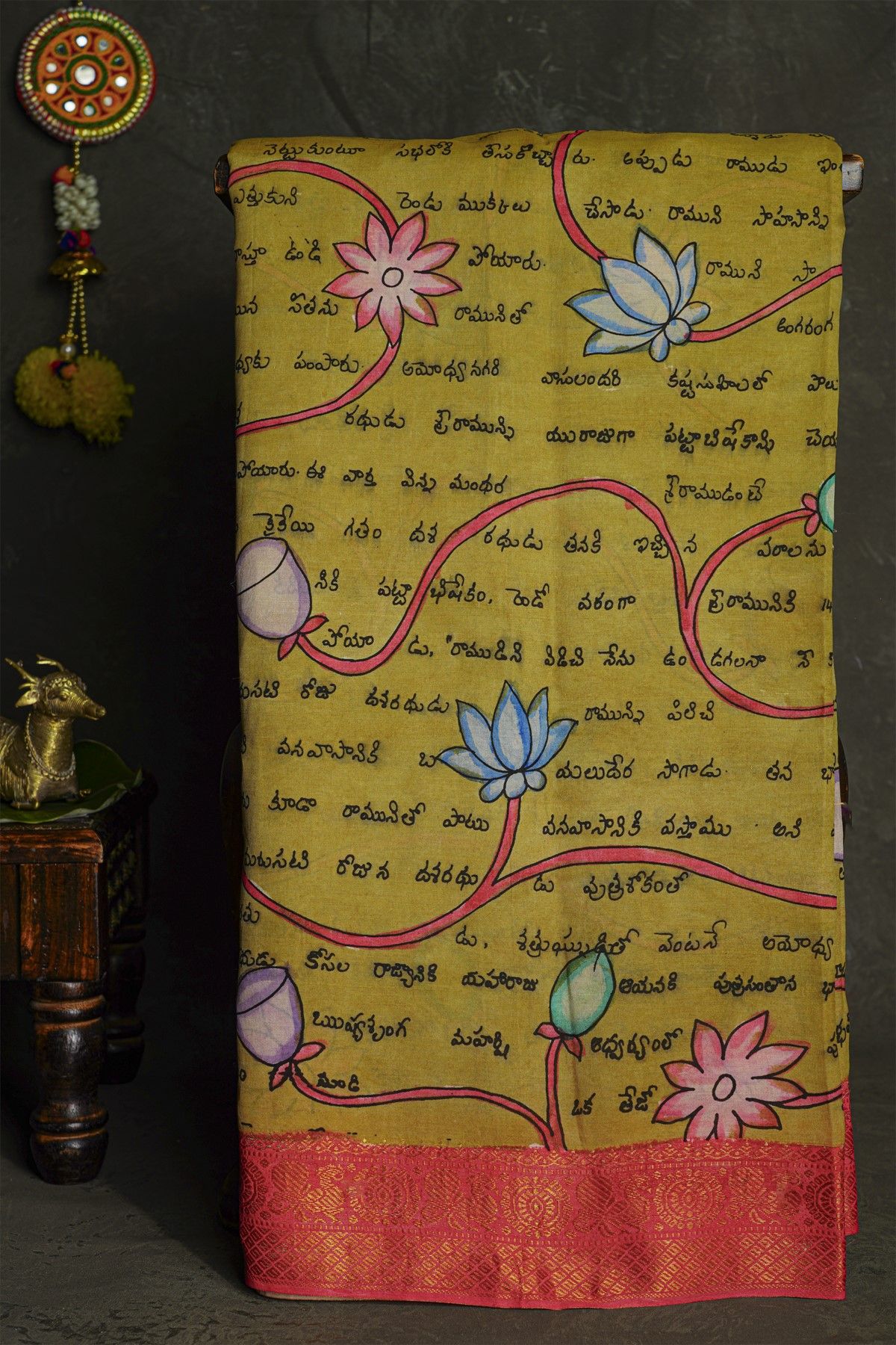 Kalamkari Silk Mehendi Green Saree With Florals And Peacocks Border