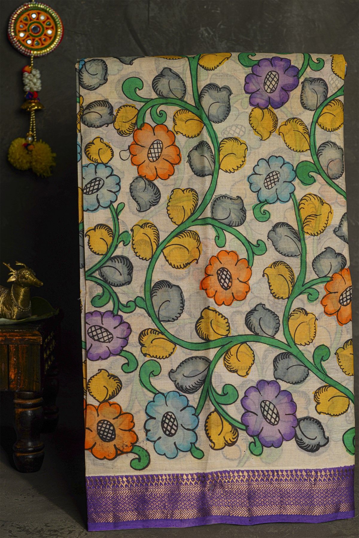 Kalamkari Cream Saree With Florals And Diamonds Border