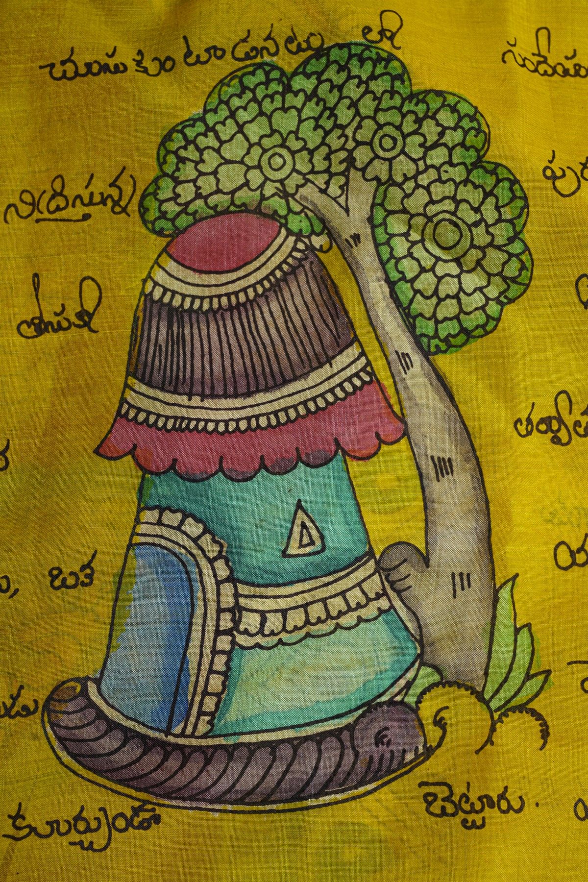 Kalamkari Yellow Saree With Florals And Cross Lines Border