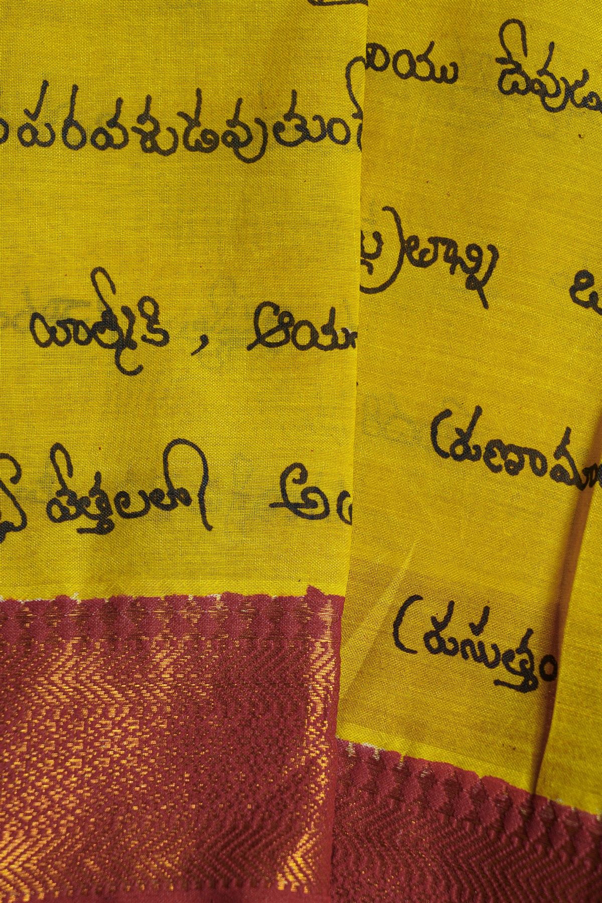Kalamkari Yellow Saree With Florals And Cross Lines Border