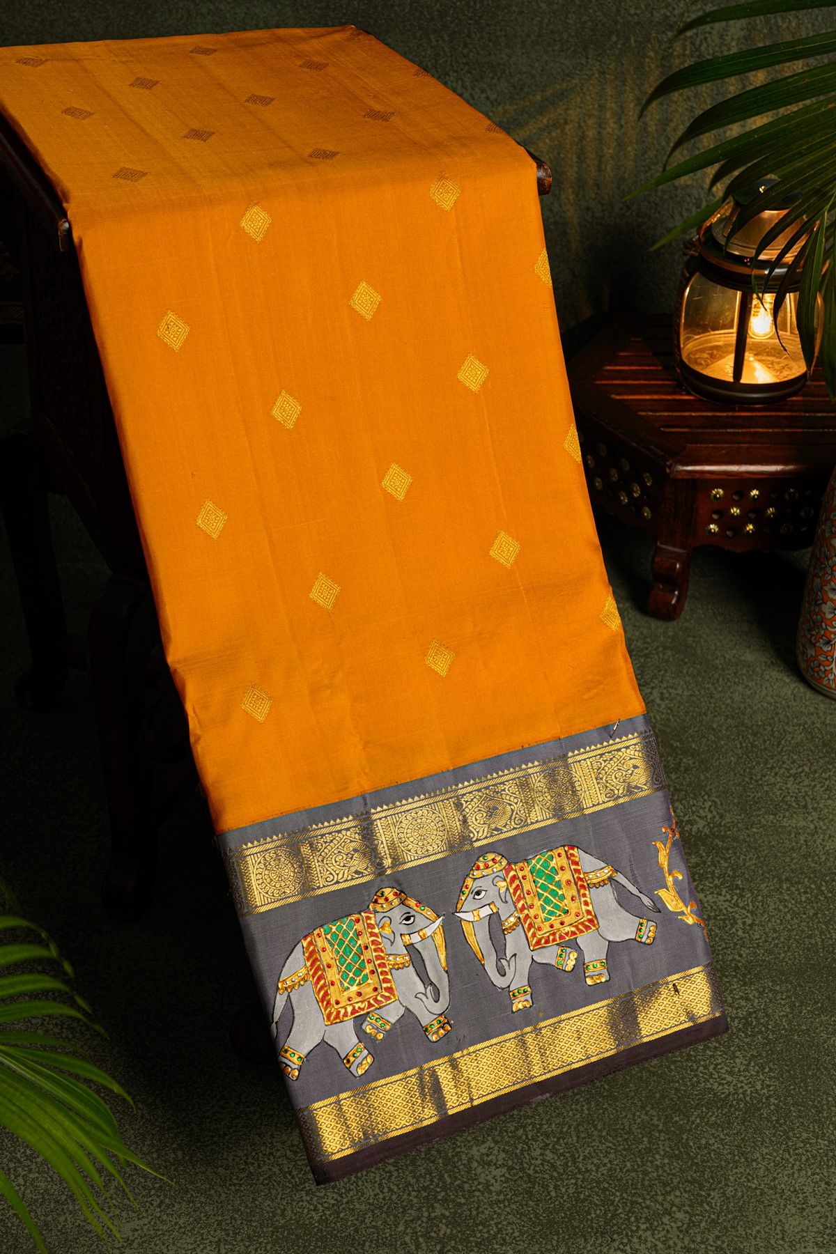 Gadwal Silk Orange Saree With Tanjore Hand-Painted Florals And Elephants Border