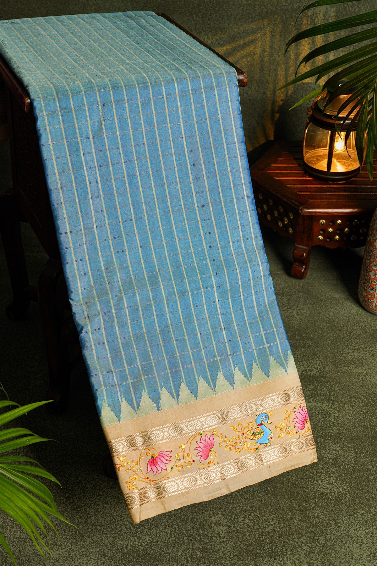 Gadwal Silk Sky Blue Saree With Tanjore Hand-Painted Florals And Peacocks Border