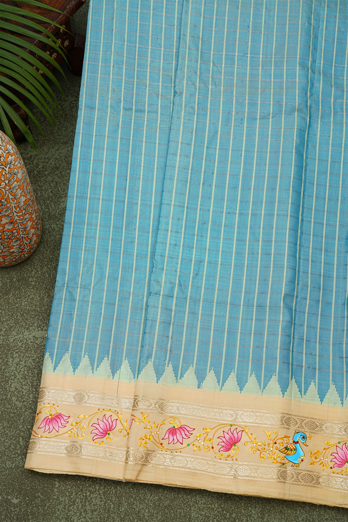 Gadwal Silk Sky Blue Saree With Tanjore Hand-Painted Florals And Peacocks Border