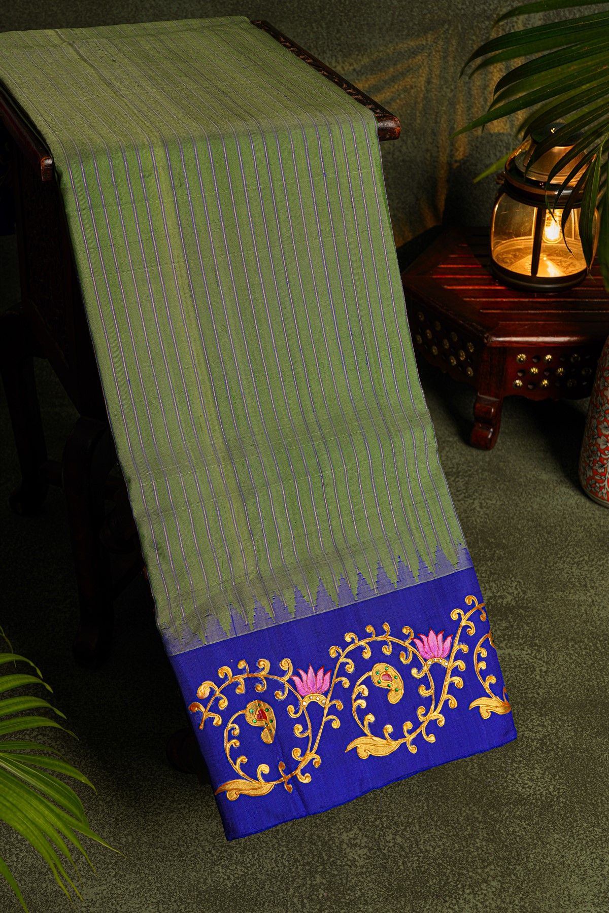Gadwal Silk Mehendi Green Saree With Tanjore Hand-Painted Florals And Gandaberunda Border