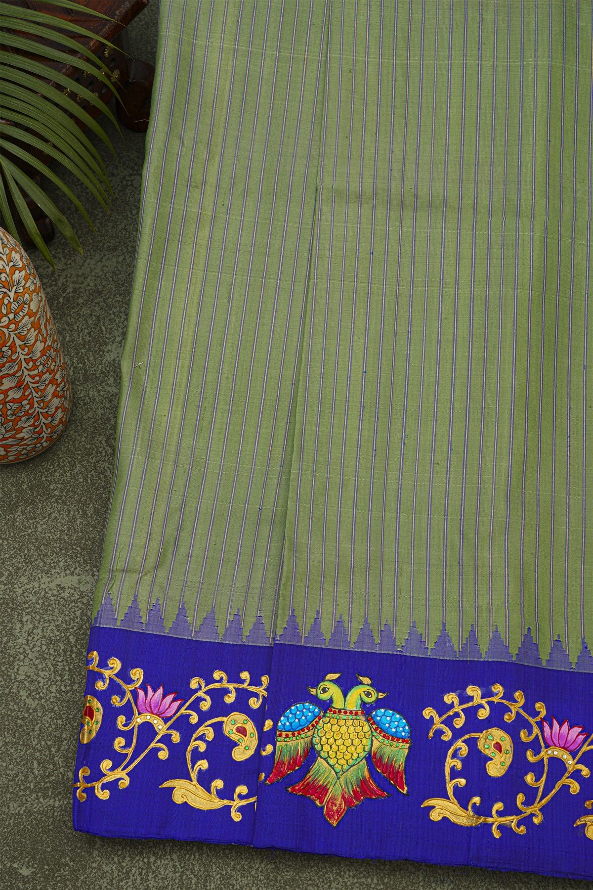 Gadwal Silk Mehendi Green Saree With Tanjore Hand-Painted Florals And Gandaberunda Border