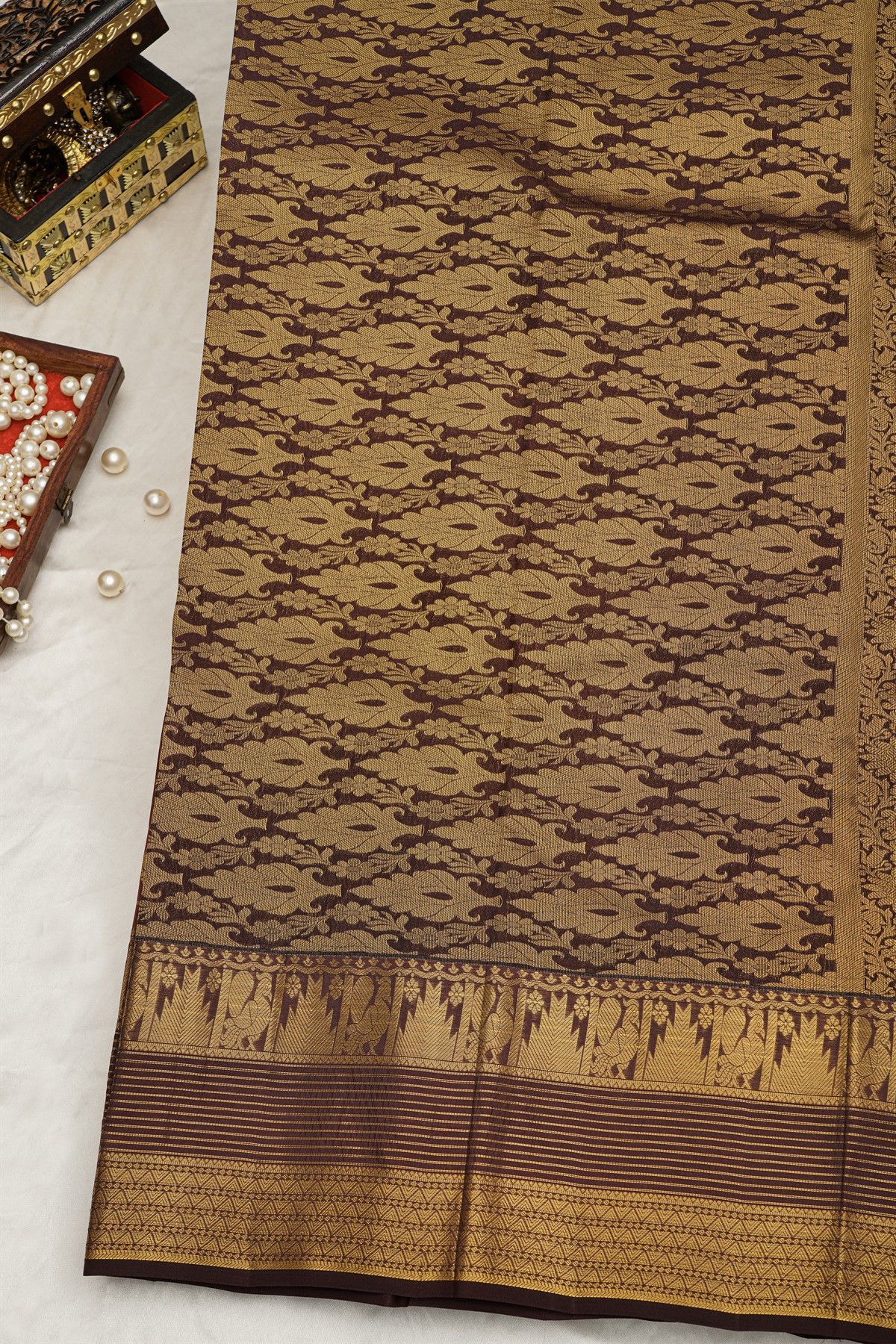 Kancheepuram Silk Rust Saree With Checks And Traditional Border