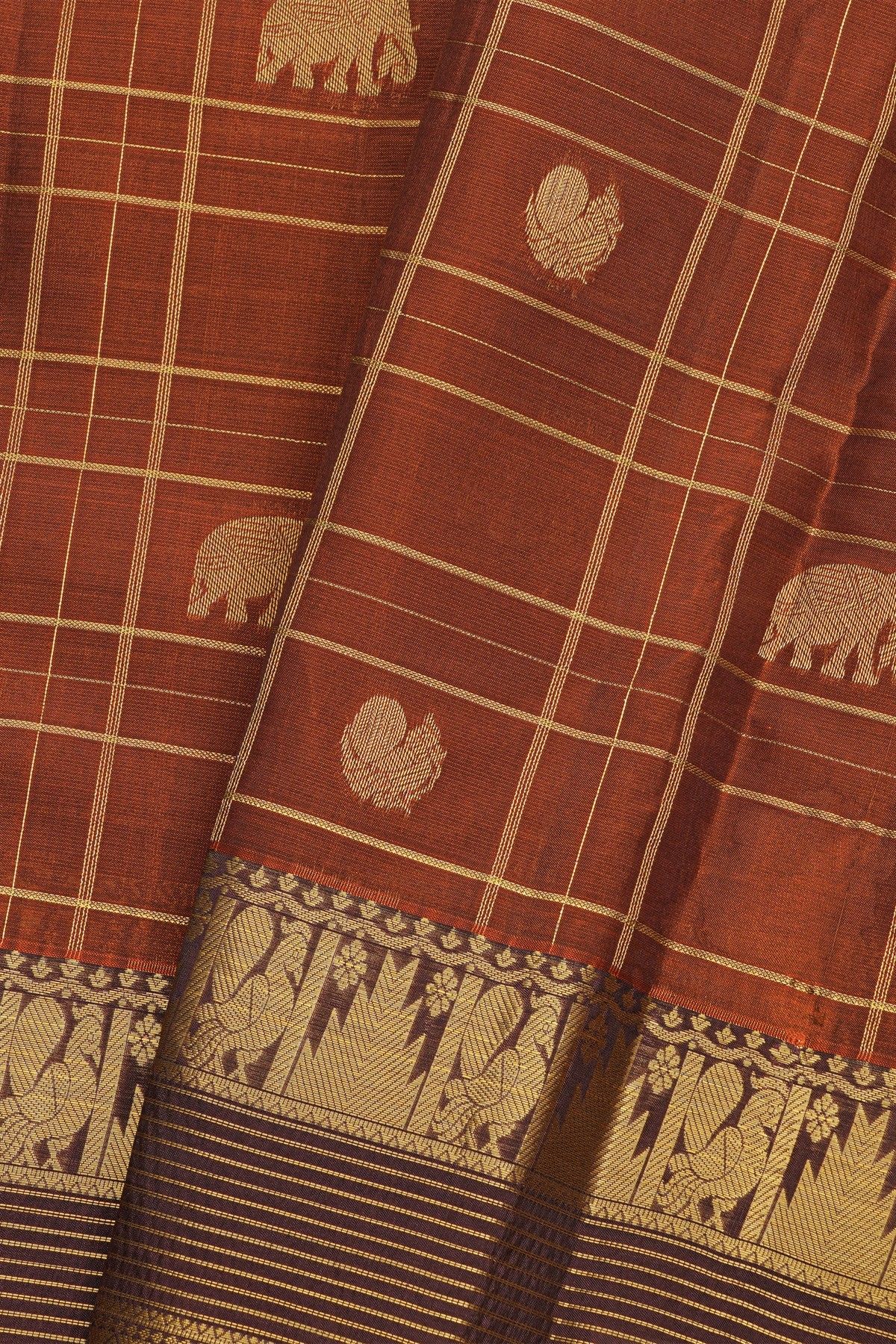 Kancheepuram Silk Rust Saree With Checks And Traditional Border