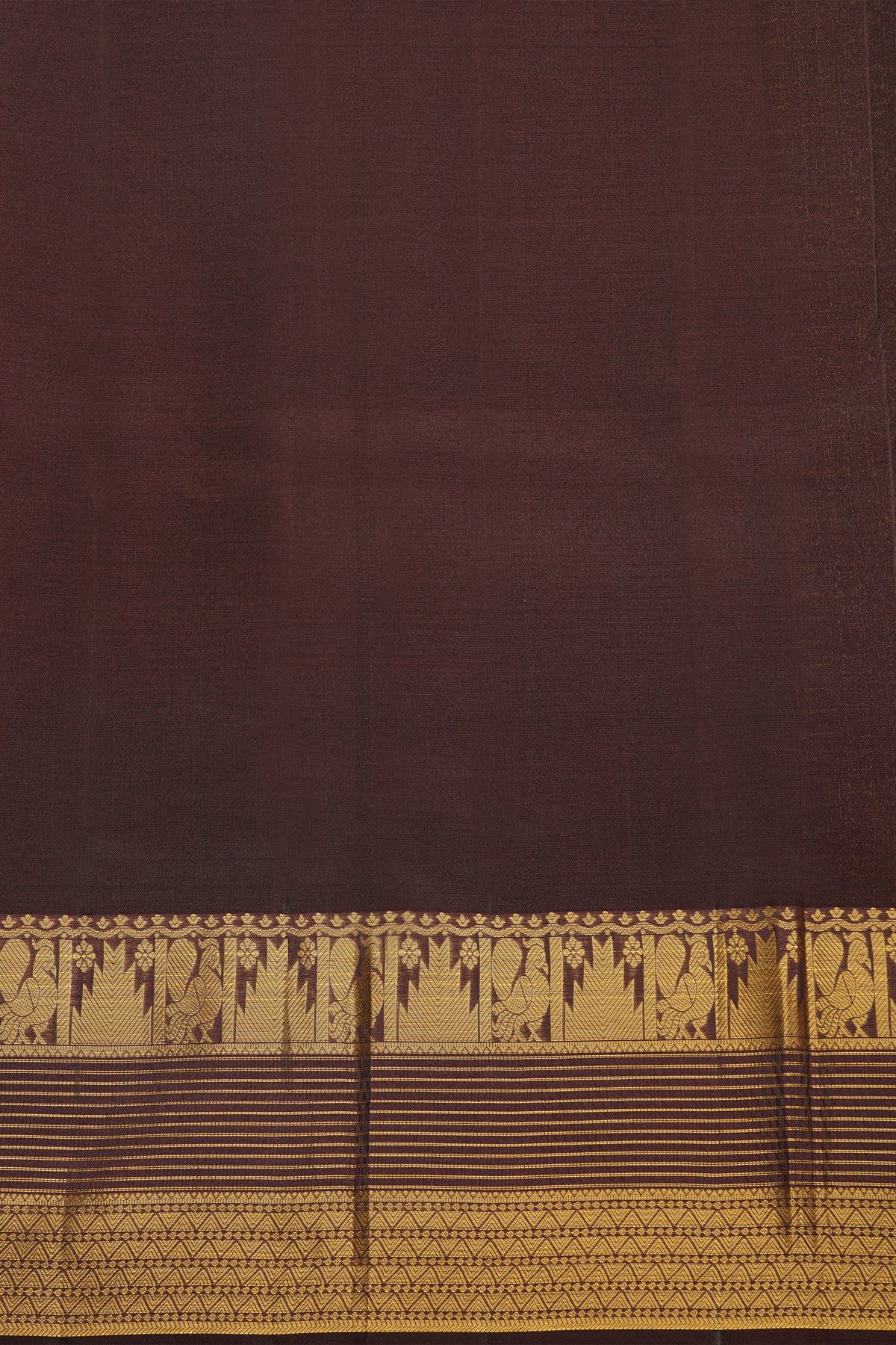 Kancheepuram Silk Rust Saree With Checks And Traditional Border