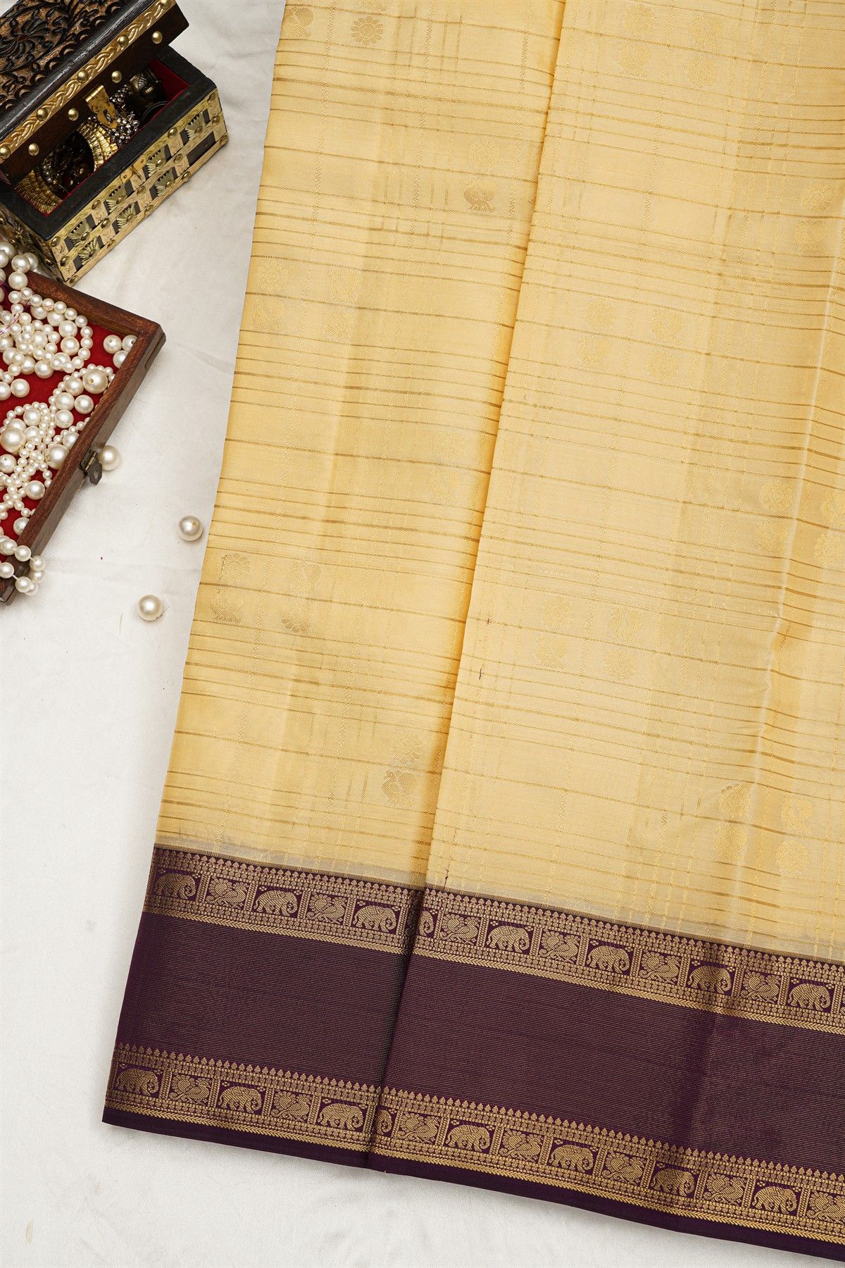Kancheepuram Silk Yellow Colour Saree With Zari Checks And Gap Border