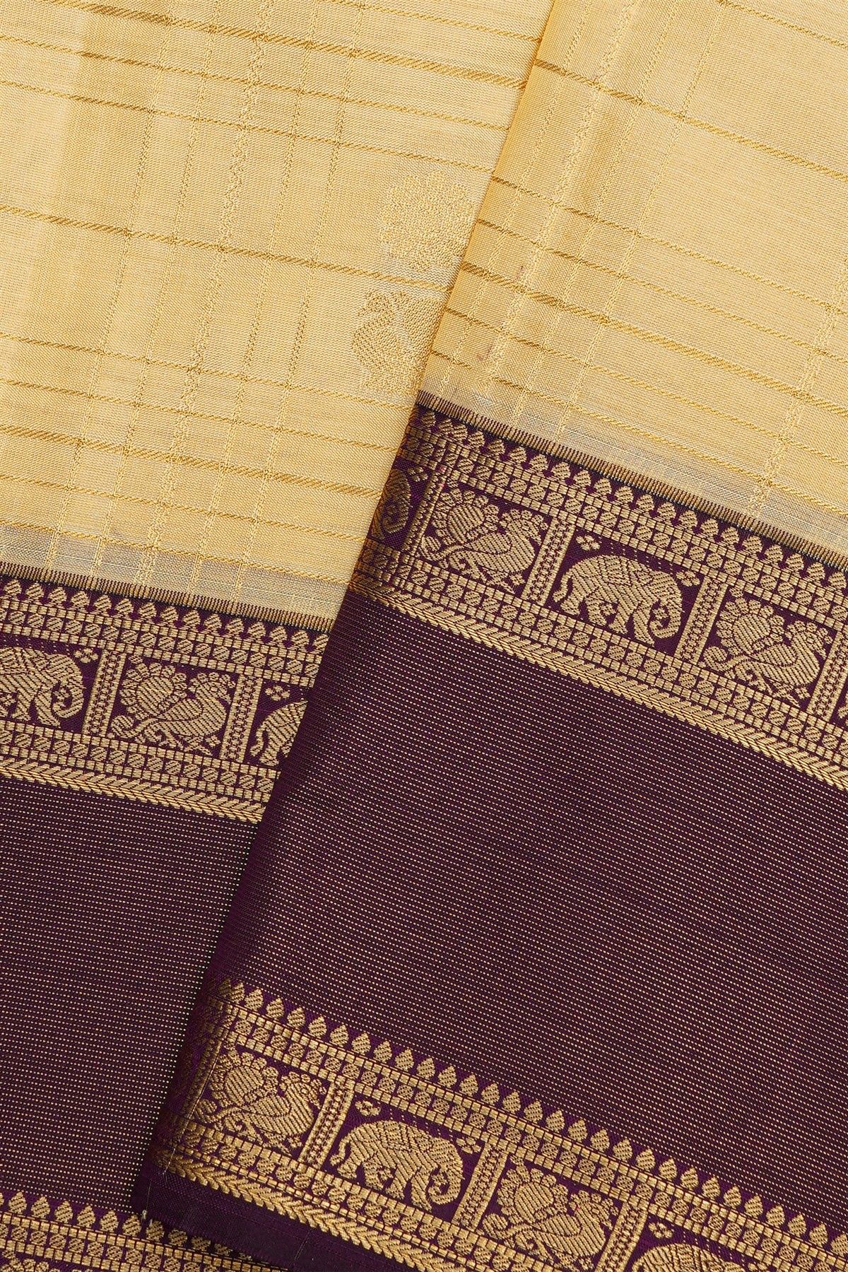 Kancheepuram Silk Yellow Colour Saree With Zari Checks And Gap Border