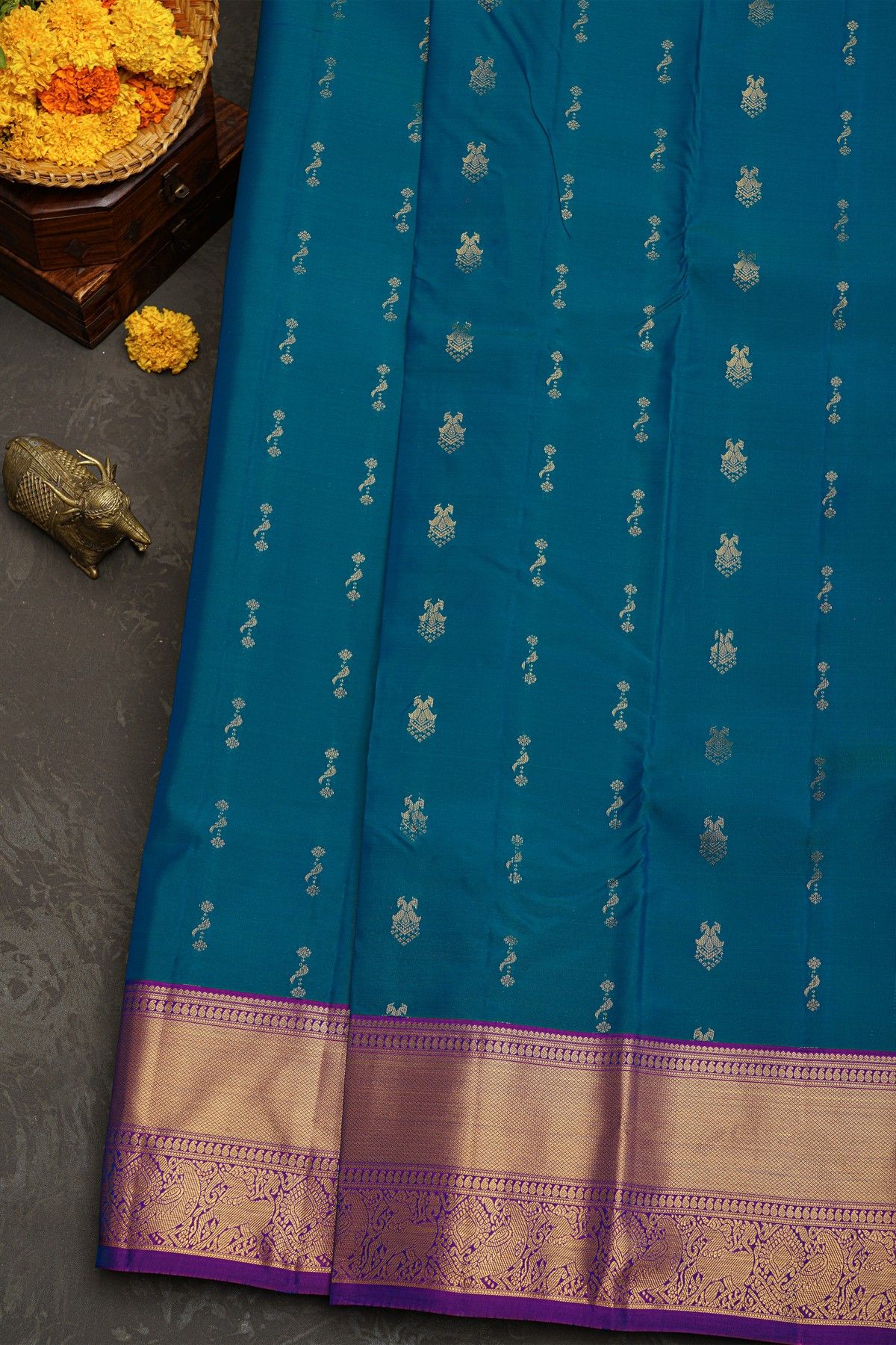 Kanchipuram Silk Royal Blue Saree With Peacock Buttis Body Kaddi Border
