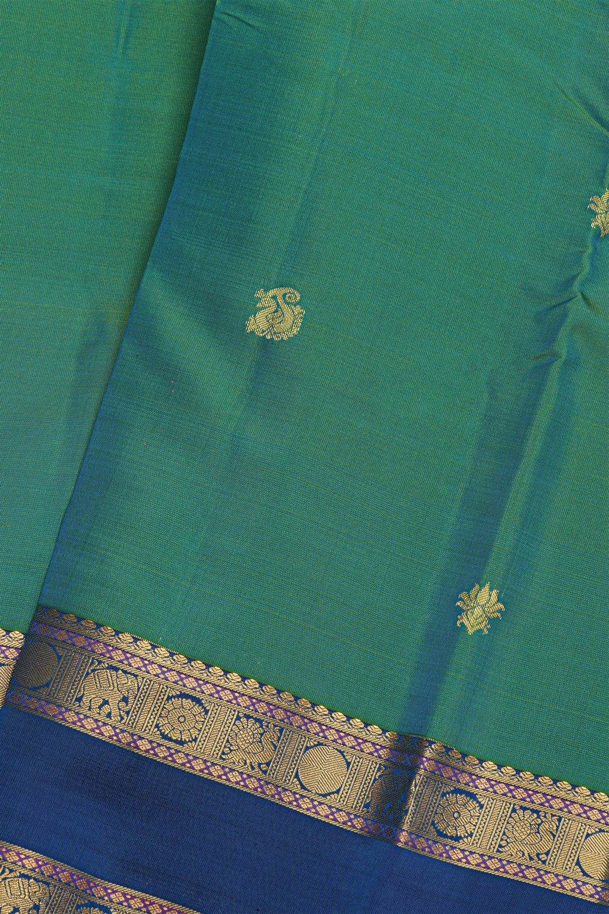 Kancheepuram Silk Sea Green Saree With Floral Buttis Body Gap Border