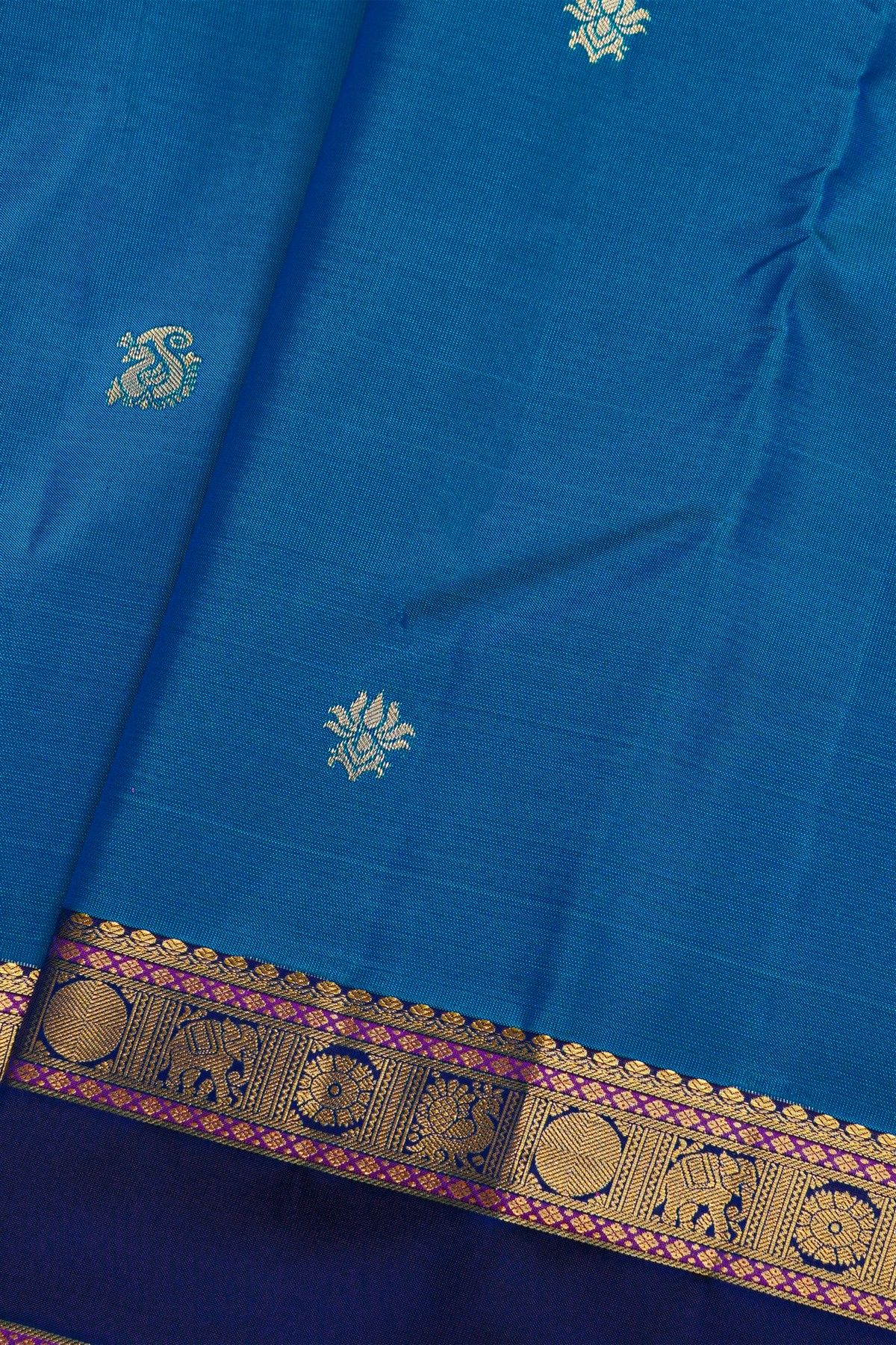 Kancheepuram Silk Royal Blue Saree With Floral Buttis Body Traditional Gap Border