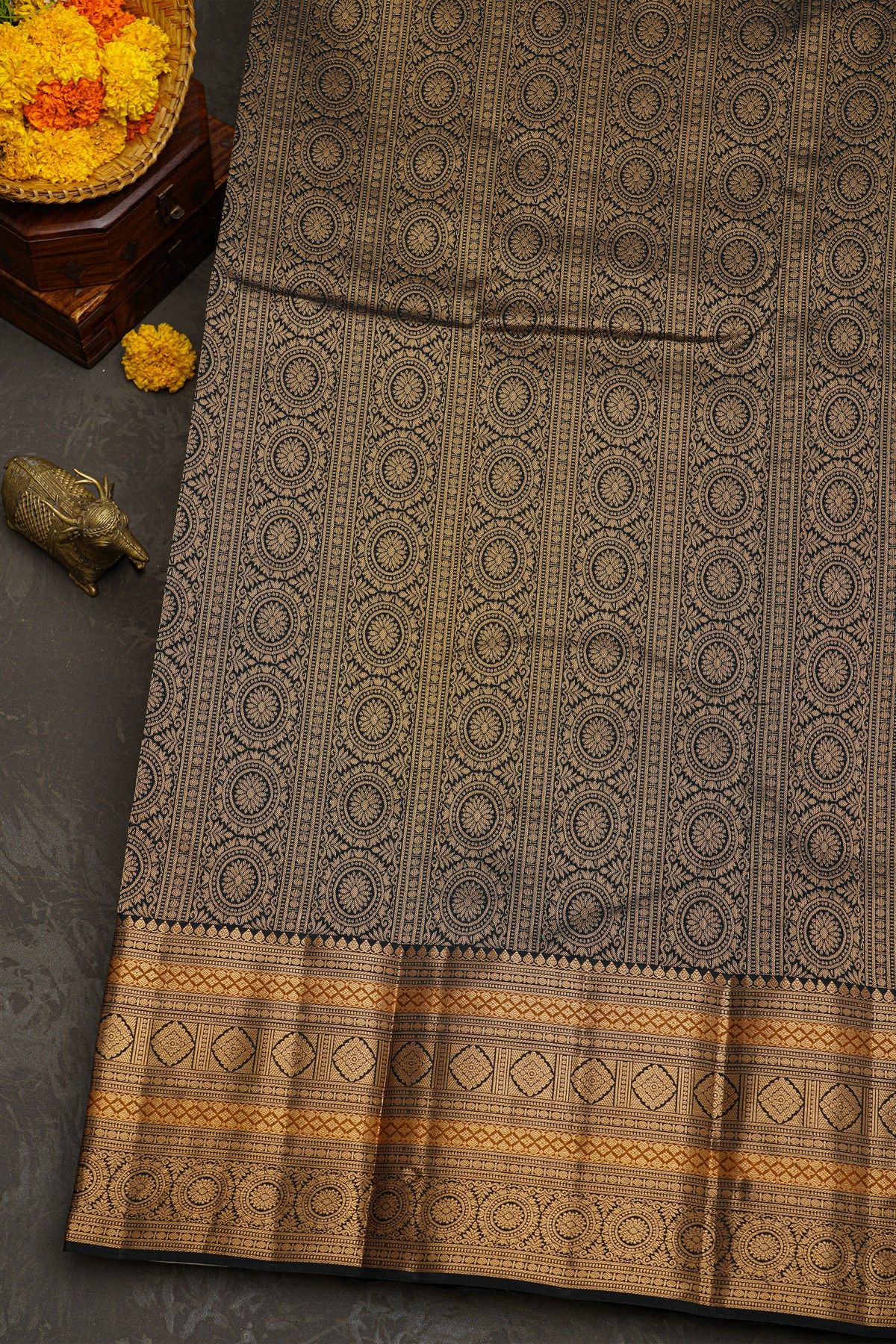 Kancheepuram Silk Rust Black Saree With Florals And Peacocks Border