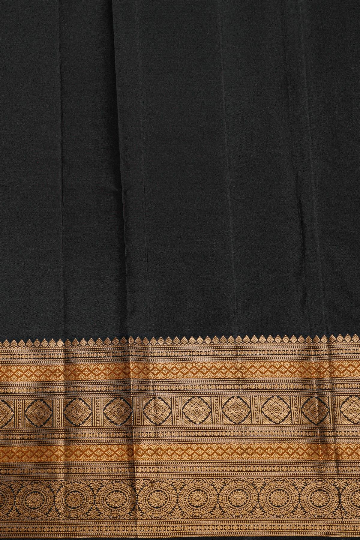 Kancheepuram Silk Rust Black Saree With Florals And Peacocks Border