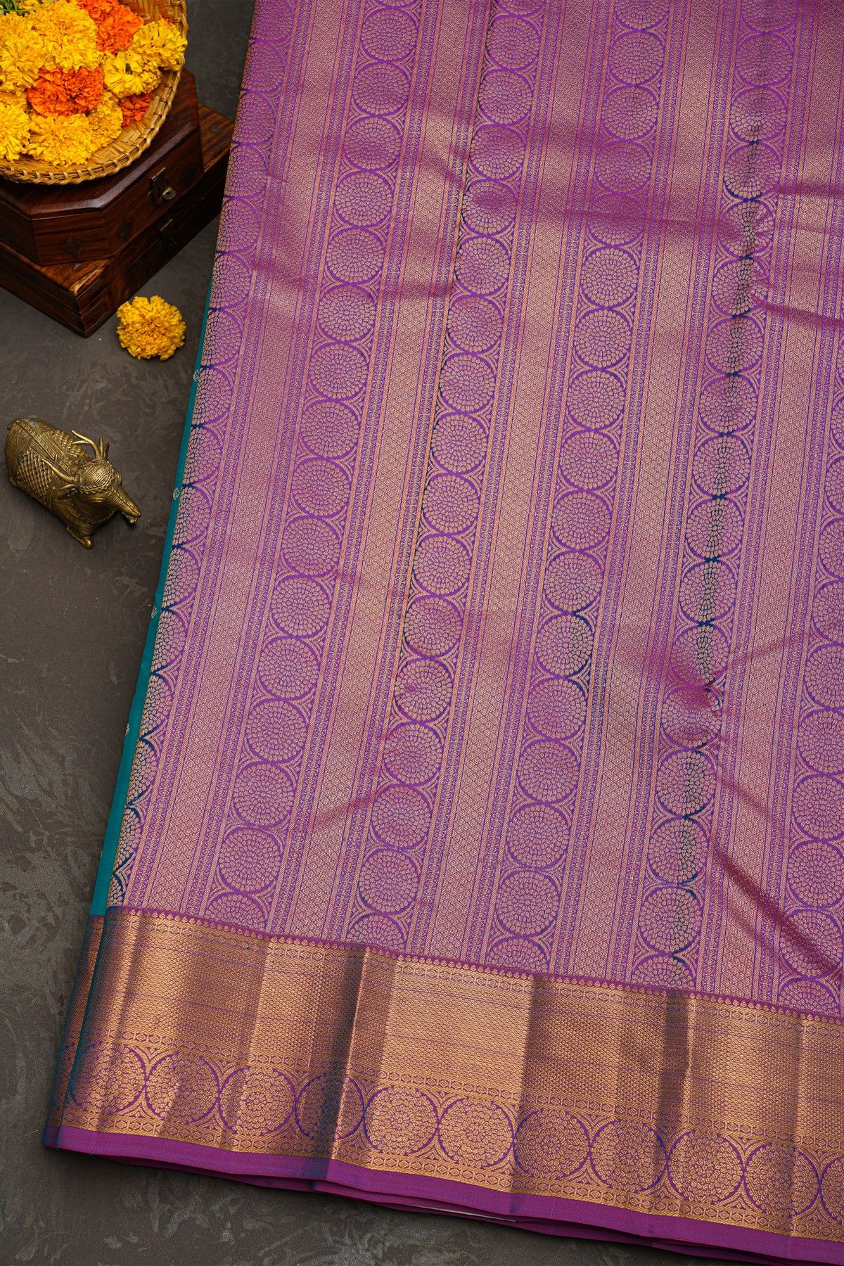 Kancheepuram Silk Sky Blue Saree With Florals And Leaves Border