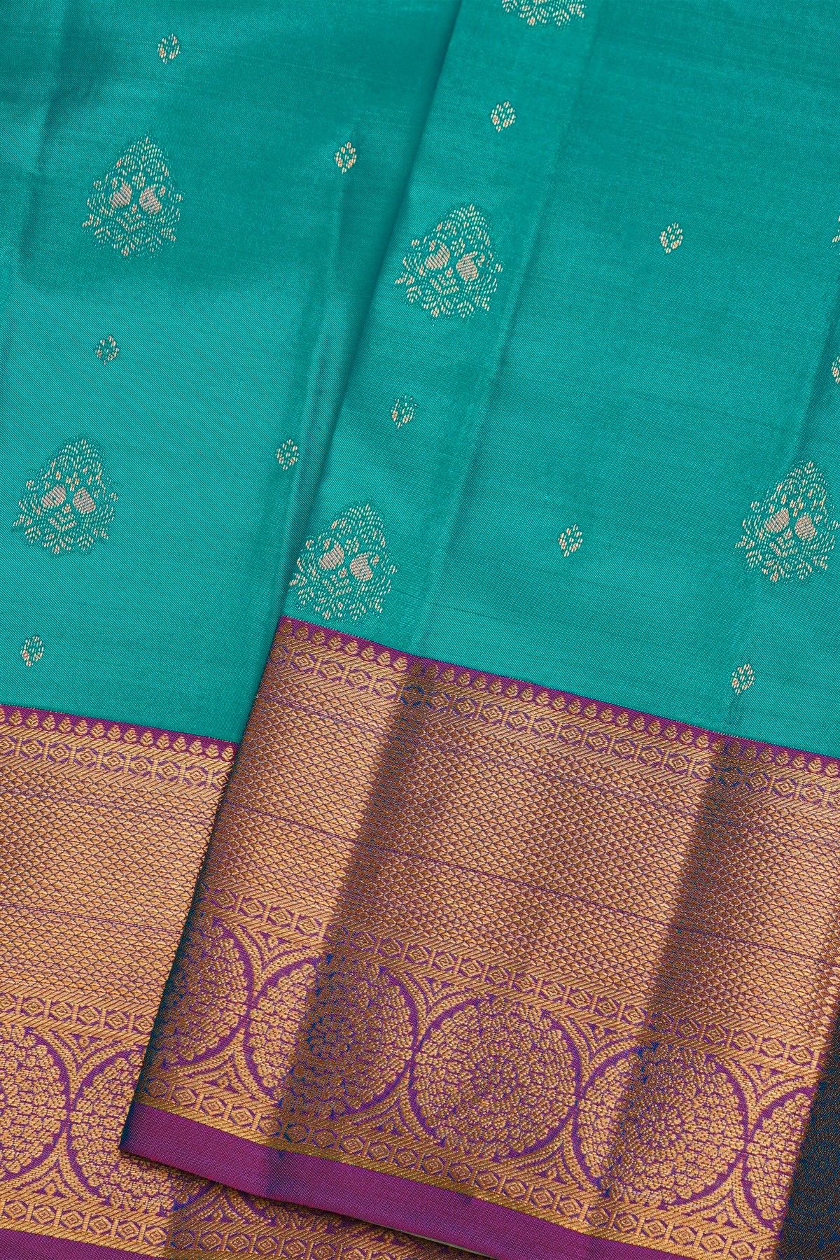 Kancheepuram Silk Sky Blue Saree With Florals And Leaves Border