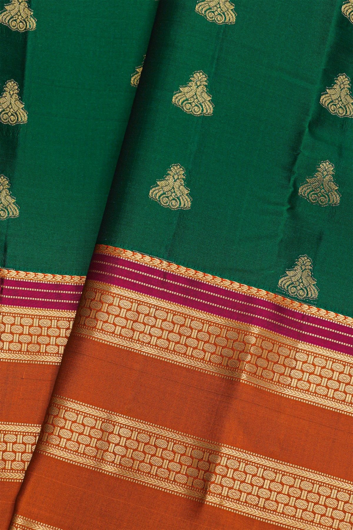 Kancheepuram Silk Bottle Green Saree With Zari Lines And Florals Gap Border
